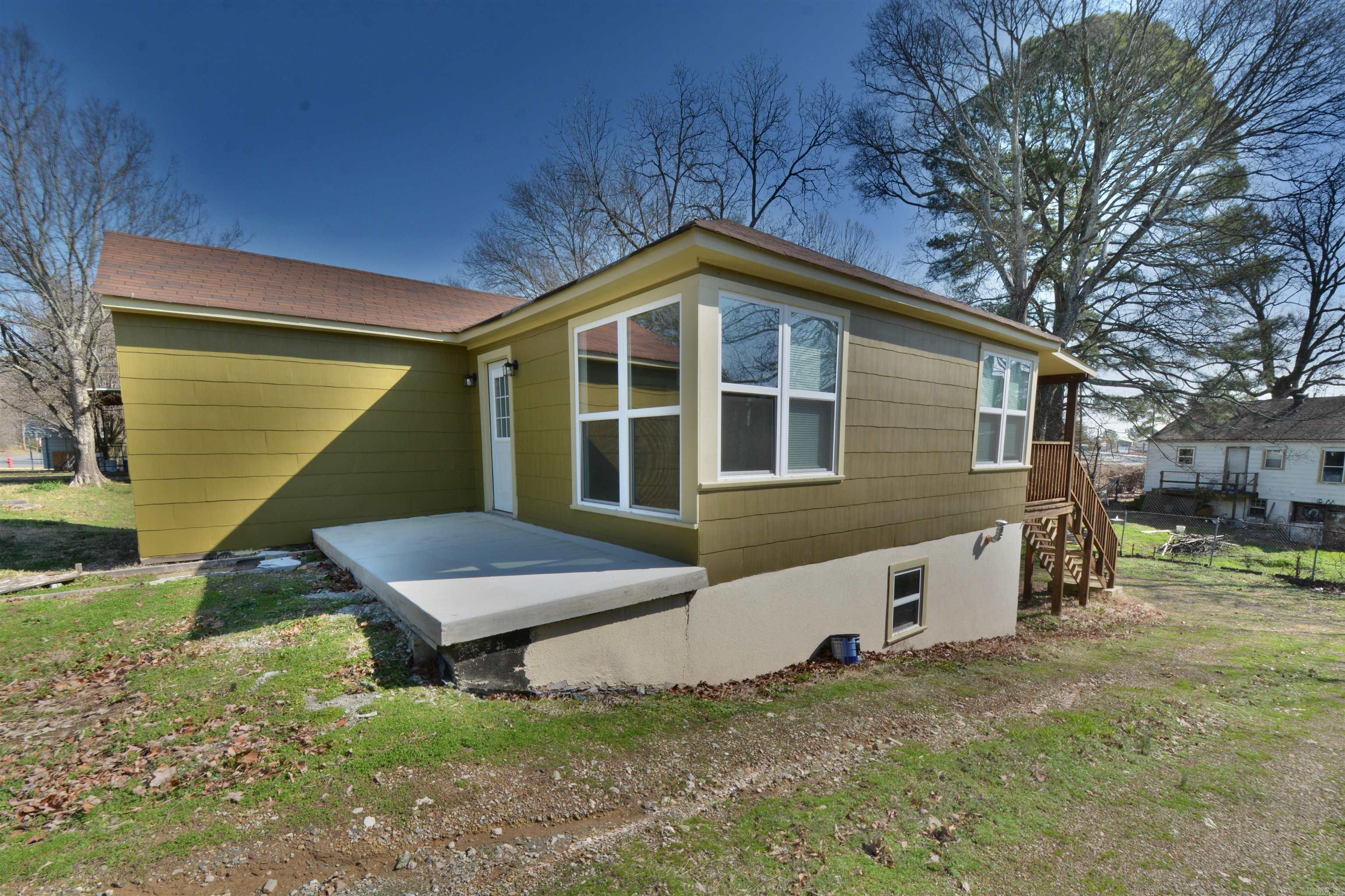 REDUCED FOR QUICK SALE-- FRESHLY REMODELED HOME WITH NEW WINDOWS, NEW ROOF 2025, STAINLESS STEEL KITCHEN APPLIANCES, TILED IN SHOWERS, FRESH PAINT, LED LIGHTING, HARDWOOD FLOORS, WITH LARGE BASEMENT AREA (850 SQ FT) DOUBLE DOORS OUT THE BACK.REAR DECK FOR ENTERTAINING & GRILLING.