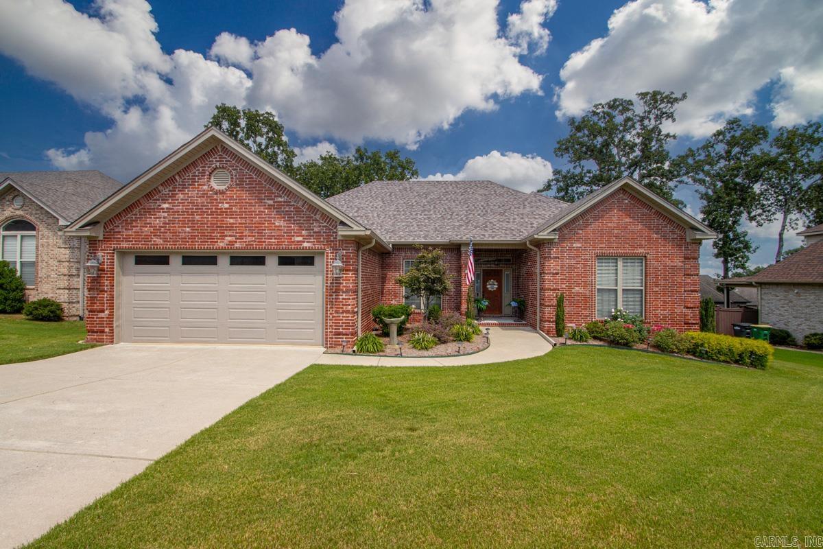 Welcome to this beautiful Millers Crossing stunner. This meticulously maintained home has extra landscaping, split floor plan and lots of outdoor entertaining space. Imagine family and friends in the spacious kitchen and gathering around the fireplace for a cozy game night. Additional features include sprinkler system, leaf guard gutters, composite decking on the back patio and a walk up attic. Roof replaced in 2019. New in 2025: garage door, master shower, exterior trim paint and backyard landscaping.