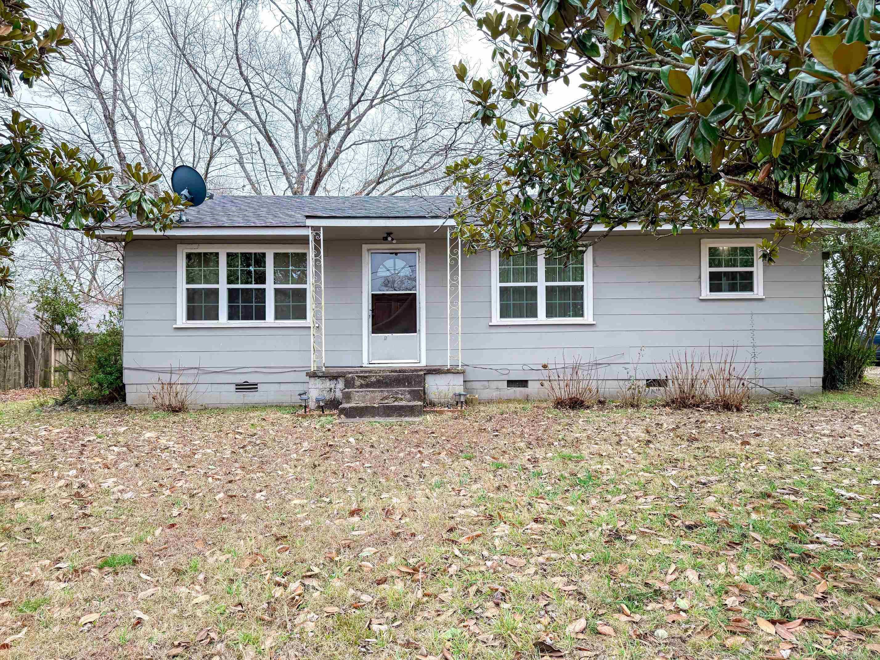 This 2 bedroom, 1 bath home has potential! This property features a dedicated dining room, a spacious living room and a large area off the kitchen that could be used as a 3rd bedroom or office space. Situated on a generous 0.40 acre lot +/-, there's plenty of room to enjoy the outdoors. An outside storage building provides extra space for tools, equipment, or hobbies. The home does need some TLC, making it a great opportunity for investors or buyers looking to add value. With the right updates, this property would make a great rental or affordable home with room to grow. Located within walking distance of Clinton Schools. No FHA, VA or RD offers will be considered.  Agents please see remarks.
