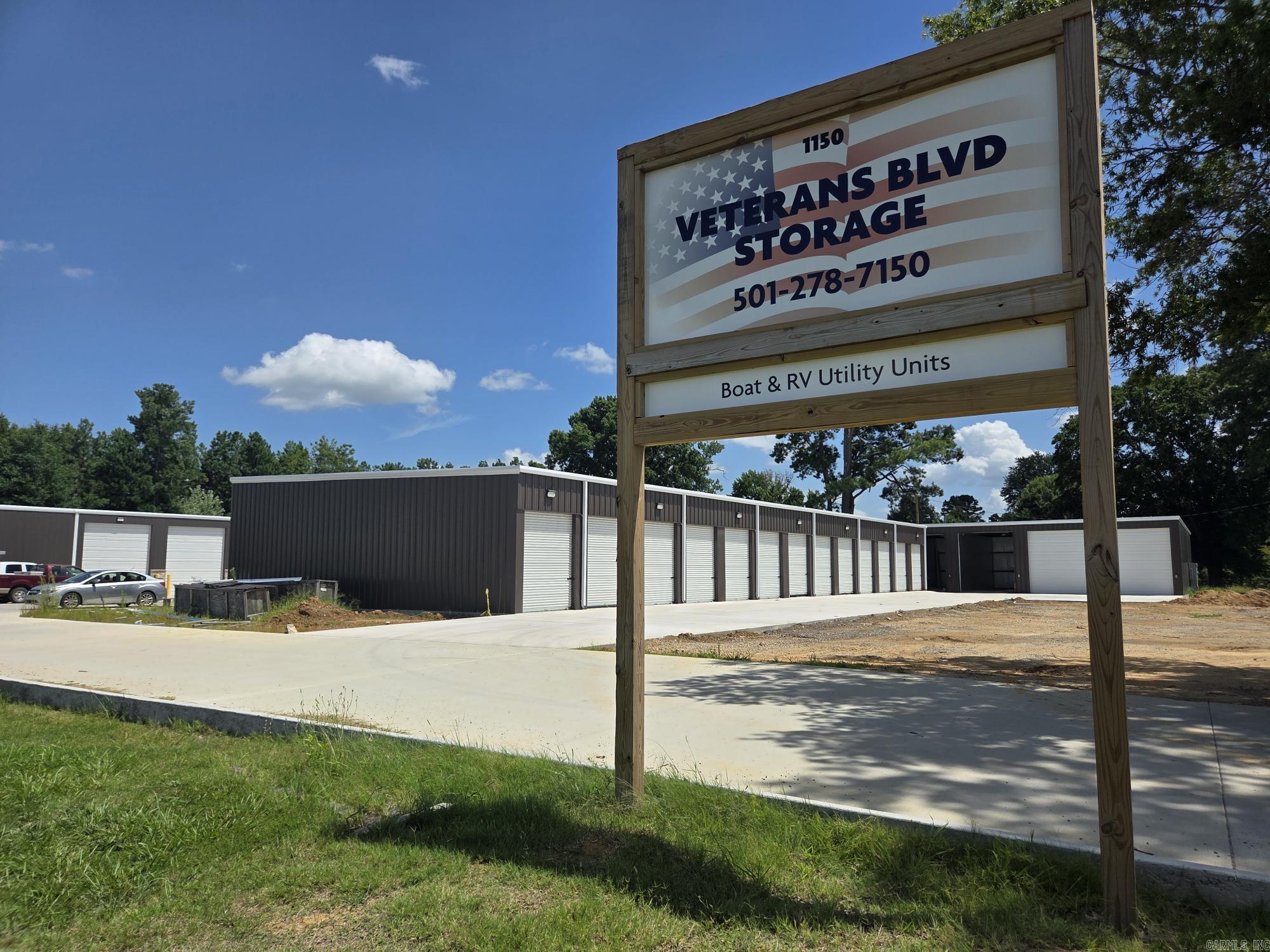 NEW CONSTRUCTION & Great investment opportunity! This development has just been completed & is over 60% occupied. Owners has decided to sell & finish their dream of building large rental storage & workspace developed for business needing a lot more space than is offered in the smaller units in Searcy. There are 46 total units ranging from (6)10x10, (7)10x20, (6)10 X30, (4)15 x30, (11)15x40, (8)15x50, (3)20x40 & (1)50x60 (3,000 sq ft) plumbed for full bath & office or flex space. Three of the 20x40's have been plumbed for a 1/2 baths. Quality red iron construction with insulation. Most units have keypad, LED lights, 14' tall overhead door with motor. Project is 90% complete but new owner can add fencing, gate, 2nd drive & concrete & it has space to add some more smaller units at the front. See agent remarks.
