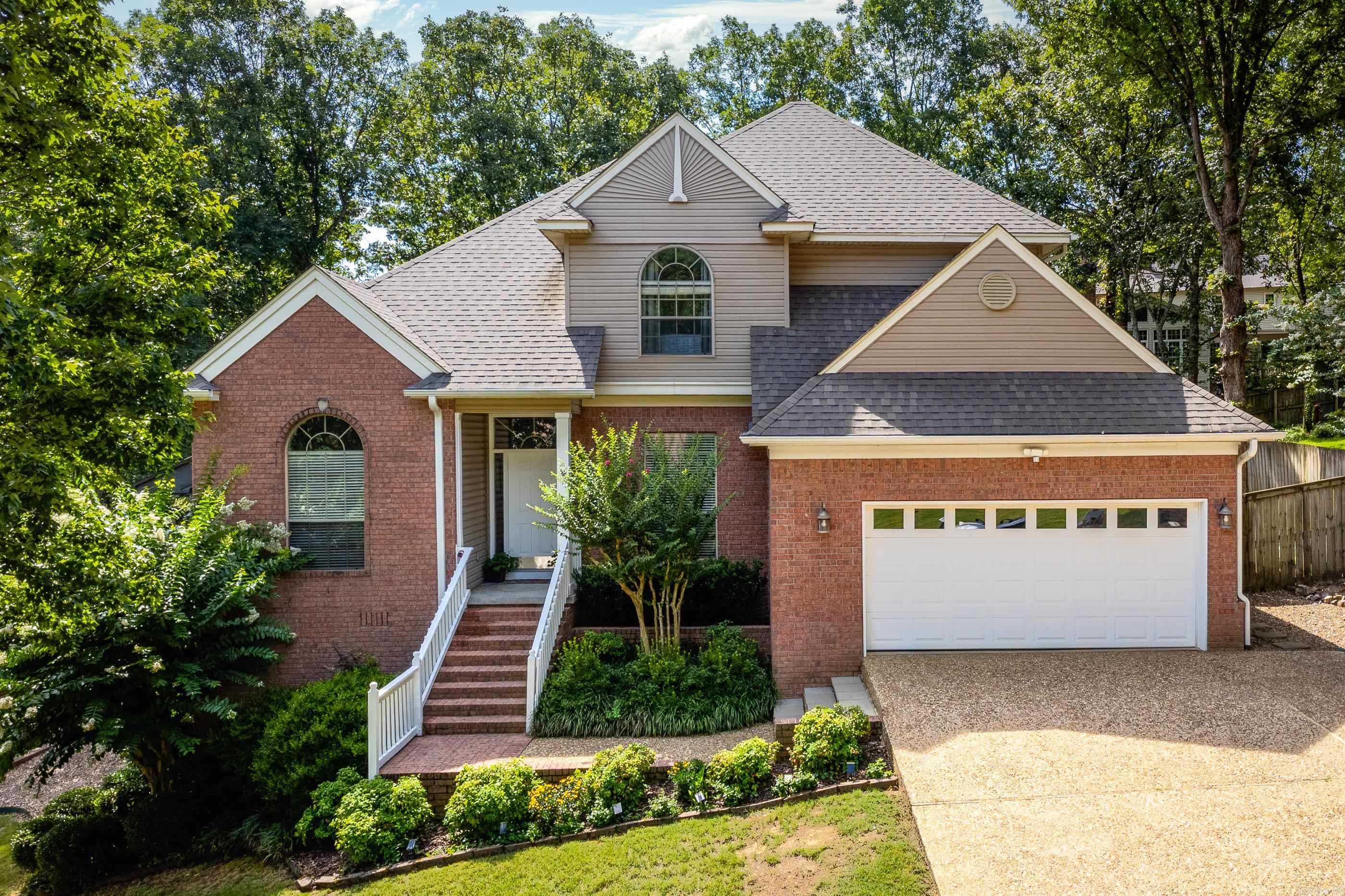 Immaculately maintained and move-in ready, this 4-bedroom, 2.5-bathroom home sits on a quiet cul-de-sac in West Little Rock and offers a spacious layout with room to grow. The main level features soaring 10-foot ceilings throughout multiple living and gathering areas, including a dining room, living room or office/study, and a large family room connected to the kitchen. The updated kitchen features quartz countertops, double ovens, and a large eat-in area overlooking the backyard. The main-level primary suite provides comfort and privacy, while upstairs features three additional bedrooms, each with double closets, plus a bonus room ideal for a home office, playroom, or media space. Step outside to a large deck made for relaxing, set against a private, tree-lined yard. An extra wide, two-car garage with an extra parking pad, along with concrete-floored storage beneath the home, perfect for seasonal items or workshop. Access to St. Charles pool, tennis and pickle ball courts. Just five minutes from Costco, the Promenade at Chenal, and zoned for Don Roberts and Pinnacle View, this one checks all the boxes for space, function, and location!