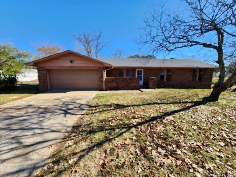 Welcome to 6938 Congo Road in Benton, AR! This charming home offers a comfortable and spacious living experience with its 3 bedrooms and 2 bathrooms. The open floor plan provides ample space for relaxation and entertainment, with two separate living areas to accommodate your lifestyle. The kitchen comes equipped with a refrigerator, making it easy to store and prepare your favorite meals. Cozy up during the colder months in front of the inviting fireplace, creating a warm and inviting atmosphere. Outside, you'll find an oversized yard, perfect for outdoor activities and gatherings. Whether you're looking to unwind or entertain, this home offers the perfect balance of comfort and functionality. Don't miss out on the opportunity to make 6938 Congo Road your new home!
