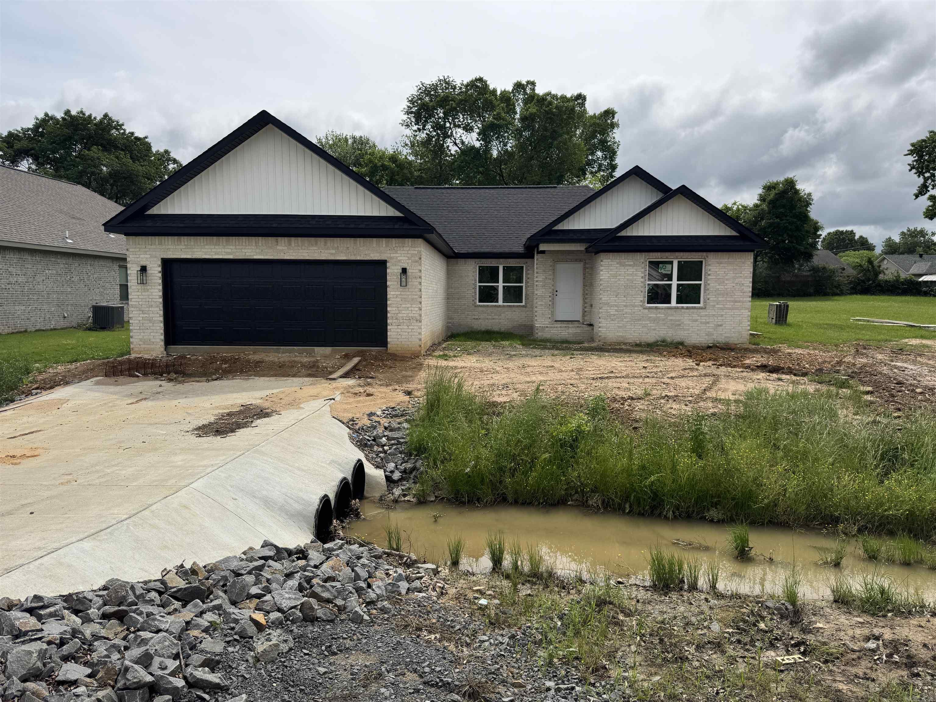 Affordable New Construction. Rural Development $0 down loan approved. All custom cabinetry and trim throughout. Luxury vinyl flooring throughout. No carpet. Bathrooms are custom tile. All counter tops are quartz. Updated lighting finishes throughout. Master suite has 2 walk in closets. House sits on a massive lot. All remaining construction due to be complete in 30 days.