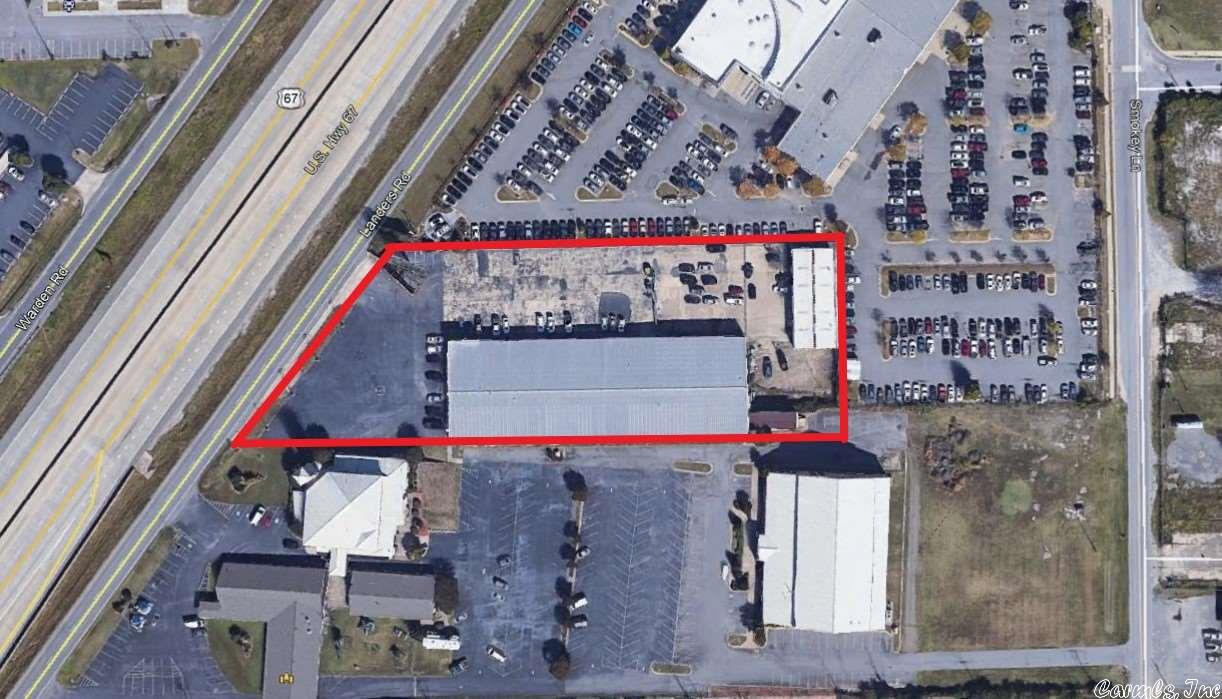 30,801+/- sq ft industrial/commercial/retail building on 2.31 +/- acres.  Zoned Highway Commercial and an 81,000 VPD traffic count! Tenant is auto dealership.