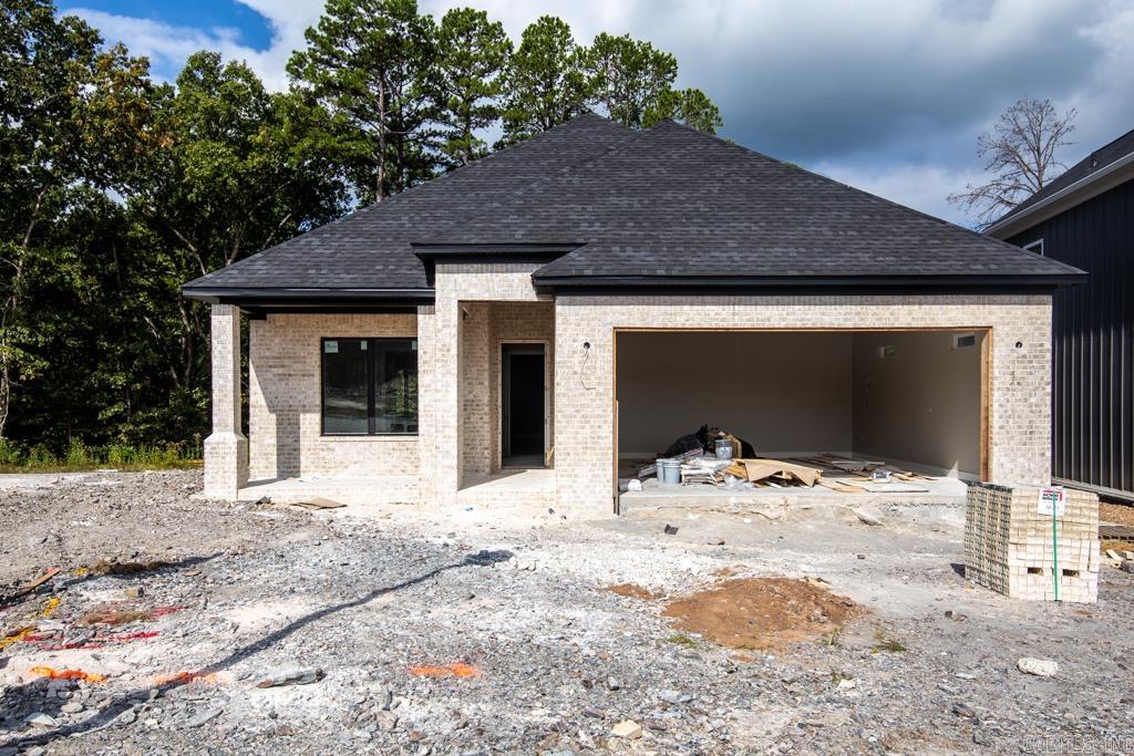 New Construction. Home with awesome open floor plan and beautiful finishes throughout. Chef's kitchen w/large island and SS appliances is perfect for entertaining and open to the den/family area with gas log fireplace. Large windows on back overlooking peaceful patio and trees. Butler's pantry and walk-in pantry between kitchen and dining. Spacious owner's suite with gorgeous bath & huge closet with built-ins and guest bedroom and bath on main level.  Huge bedroom & bath up. Completion Aug/Sept.  Come See!