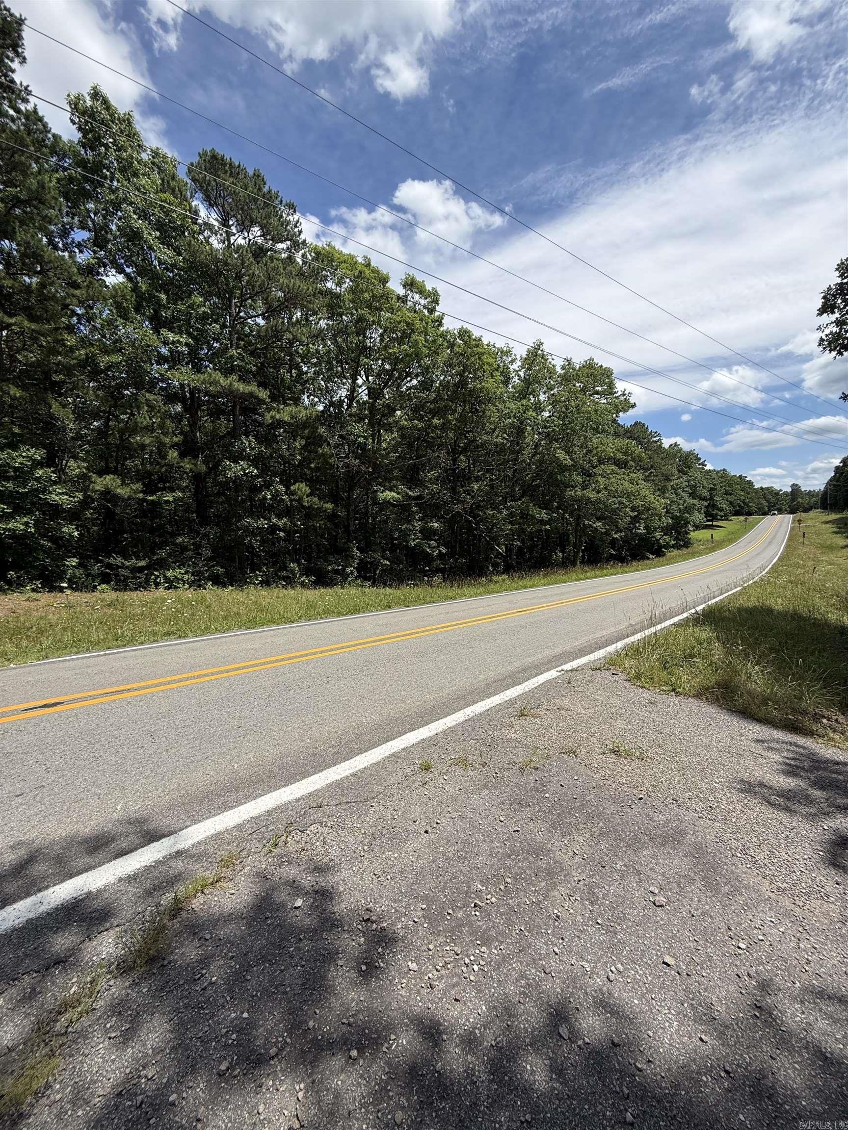 Beautiful 2.98-acre wooded tract in a peaceful country setting. This unrestricted property offers paved road frontage, nearby utilities, mature trees, and multiple building sites. Whether you're looking to build a home, cabin, or getaway retreat, you'll appreciate the privacy, natural beauty, and endless possibilities this property has to offer.