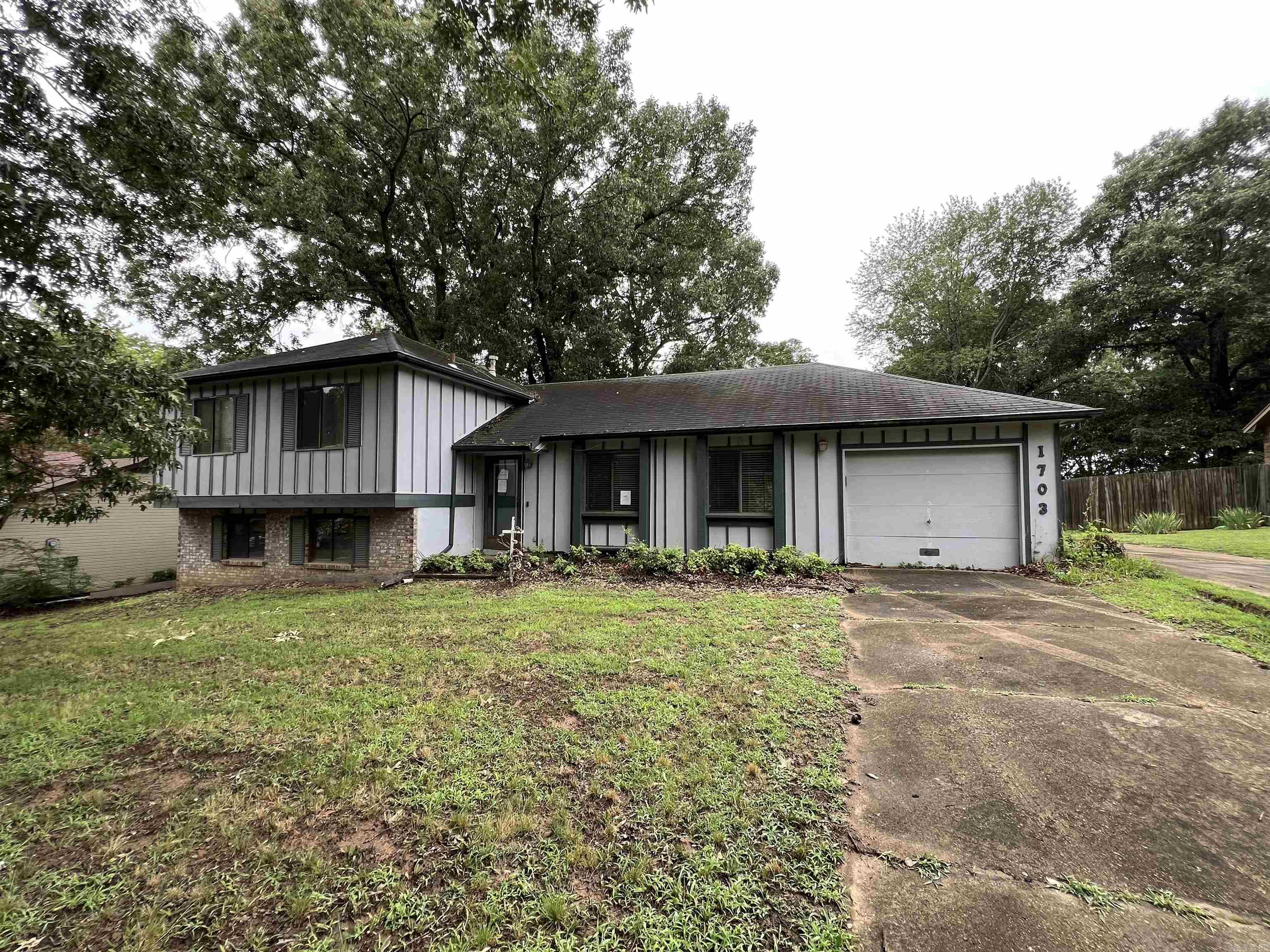 This 3 bedroom, 2 bathroom tri-level needs work but offers three levels of living space, multiple living areas, a 4th bedroom and half bath in the basement. The following Flood Zone information has been obtained for the property, Flood Zone Designation: X. Systems are not guaranteed to work. Earnest Money is required. Agents see additional remarks. There is a 1-car attached garage, and a double carport! Plenty of parking and plenty of possibilities await. Will not work for all financing.