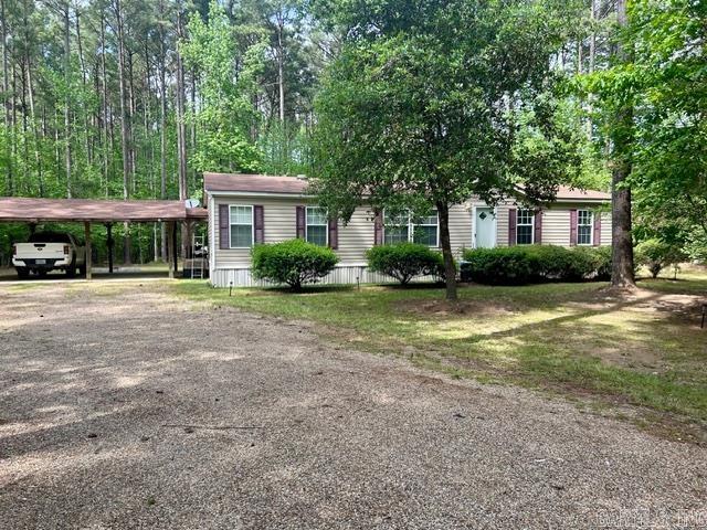 Looking for peace, privacy, and a move-in ready home? This beautifully maintained 3 bed 2 bath mobile home sits on just over 3 acres of quiet countryside - perfect for those who want space to roam without sacrificing convenience. It is well-kept and move-in ready, qualifies for government loans (FHA, VA, and USDA), and has a spacious open layout. Two sheds for storage. Square footage, lot size, and acreage taken from courthouse records.