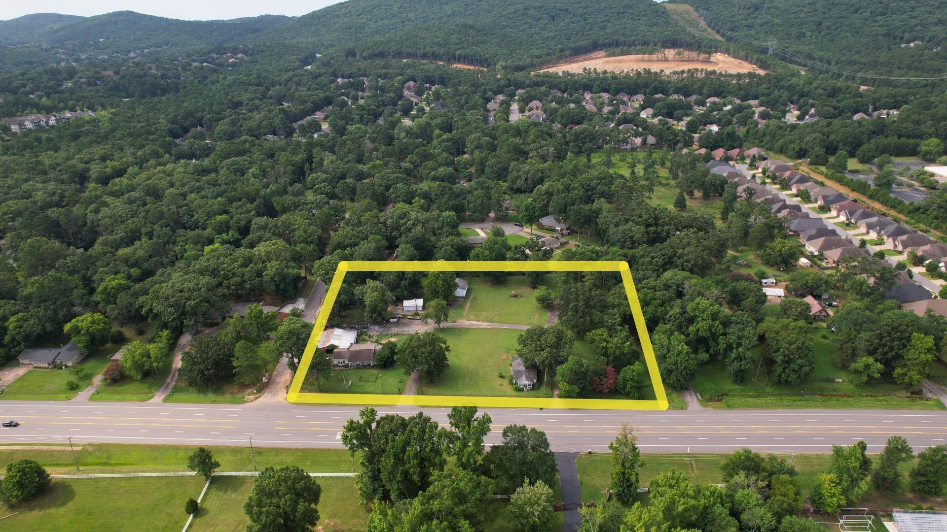Exceptional frontage on Cantrell Road (Highway 10) in one of West Little Rock’s fastest-growing corridors. This versatile property is labeled “Transition” on the City of Little Rock Master Plan, offering a wide range of development options and strong flexibility. Key features include: -Prime visibility and heavy daily traffic along a major arterial road -Strong proximity to new developments, major rooftops, and retail corridors -Current improvements: Three homes (one occupied by the existing business) 2 rented in a monthly basis + a 48' x 50' weld shop and a few other storage buildings. Industrial use permitted as long as the welding machinery remains; however, the City of Little Rock has confirmed broad flexibility for redevelopment. This rare “dirt” opportunity is ideal for medical/professional offices, retail, mixed-use, or other commercial development in a high-growth area. Whether you’re looking to build new or reposition the site, this property delivers outstanding potential in a proven West Little Rock location. It's a portafolio of 4 properties addresses 2 Maywood, 14 Maywood, 18801 Cantrell and 19901 Cantrell