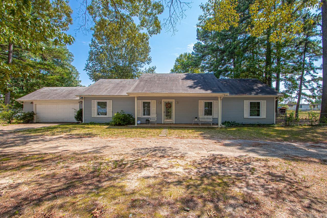Welcome to this charming, well maintained 3-bedroom, 2-bath home nestled in the quiet Amy Terrace subdivision of Little Rock. Built in 1994, this inviting 1,682 sq ft one-level home offers comfort, convenience, and nearly half an acre of space to enjoy. Step inside to find a functional layout with a spacious living area with a vaulted ceiling. The floor plan allows you to enjoy the kitchen, dining room and living room all together. Recent updates include a new HVAC system (2023), roof (2017), water heater (2020), and replacement windows (2021) for peace of mind and energy efficiency. Outside, you’ll love the large 0.47-acre lot, complete with mature shade trees. There is a fully fenced backyard, and an inviting covered and screened in patio for entertaining and relaxing. For convenience, there is a circle driveway and attached 2-car garage—plenty of parking for guests. Perfectly located just minutes from schools, shopping, and easy access to town. See Agent Remarks