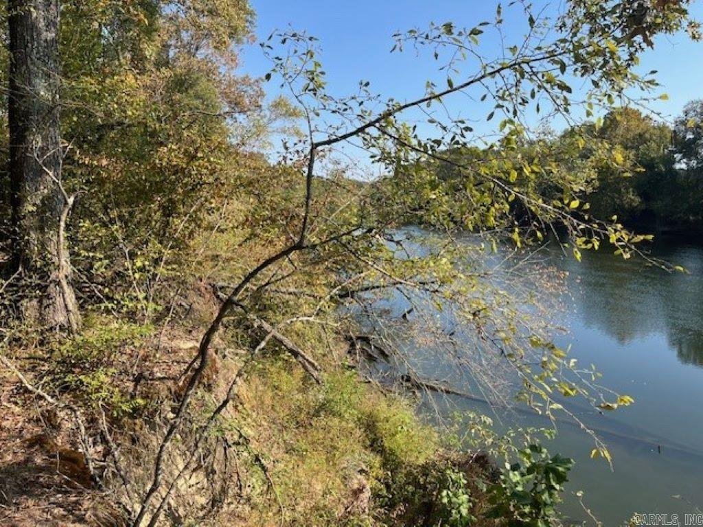 Ouachita River lots with county road access along Open Banks Road.  Municipal water, electricity, and fiber internet access at road add to the enjoyment of the property. Less than 8 miles and 15 minutes south of Arkadelphia.  Survey pending, no deed restrictions or covenants. Lot 7