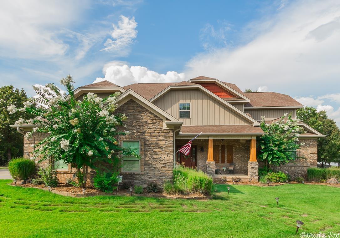 Beautiful 5 bed, 3full , 1half bath  with, office, large game room and  on approximately 1 acres.  Owner's suite  on main floor with bathroom and spacious closets.  Three bedrooms upstairs one with bath and there are addition hall baths and half baths throughout, including the main living area, and the garage/pool area.  Approx 550  s.f. heat and cooled living space over shop, fence area with a large inground, saltwater pool, all in excellent condition. Approximately 1 acre. Geo-thermal heat & cool