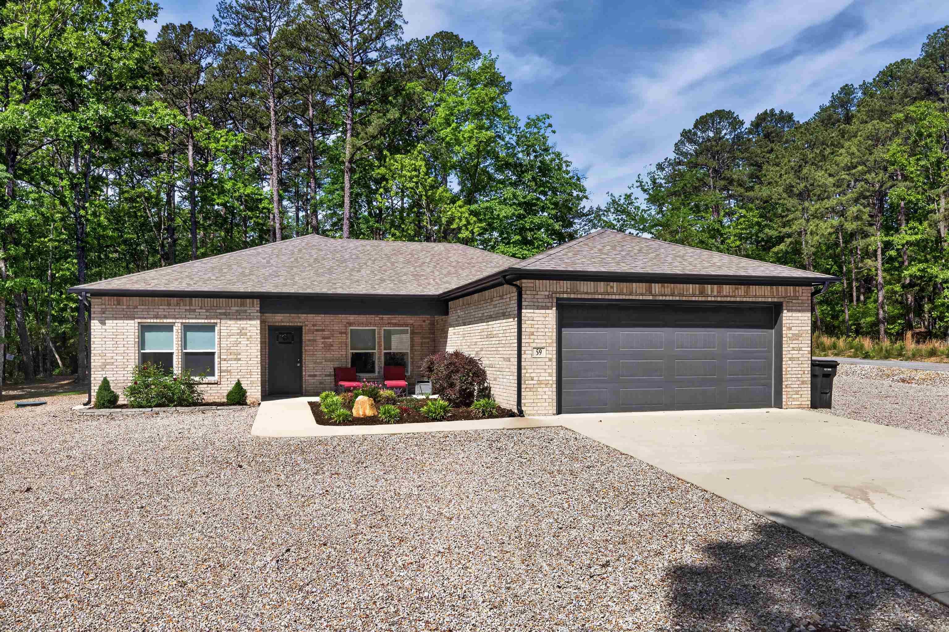 Want new but don't want to build? Now is your opportunity to walk in to this meticulously cared for home. All brick home located in the middle of the Village giving you easy access to area amenities. Open floor plan that easily flows from the great room to the kitchen and dining area making entertaining a breeze. Large island in the kitchen.  Windows bring the outside in to the living/dining area with linear fireplace. Granite throughout. Freshly painted. Master tile walk in shower and walk in closet. Primary bedroom and primary bath with walk in shower and walk in closet. Divided bedrooms give you and your guests the privacy desired. Convenient laundry off garage.  Covered patio for nature watching.  Two car garage accommodates a four door pick up! The shelves and tool cabinet in garage will stay. Agent Remarks.