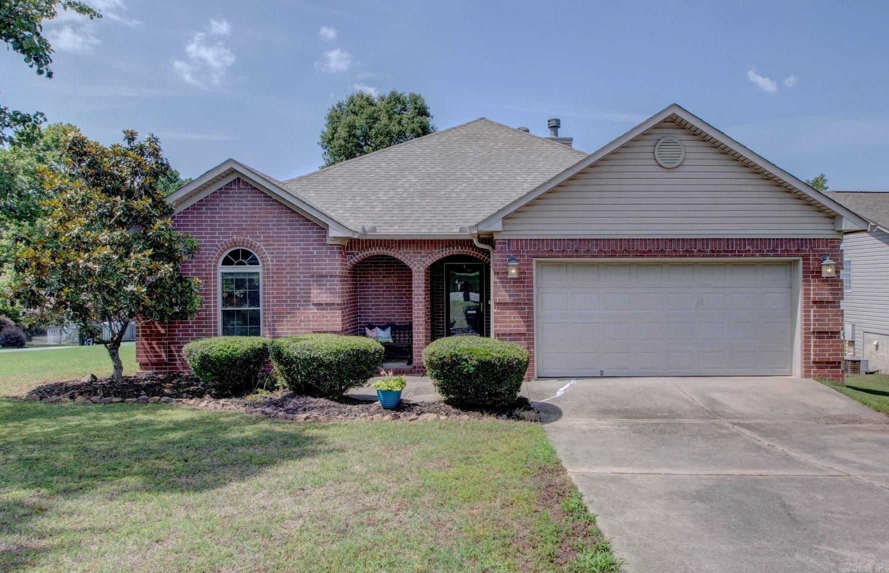 Hop in your car and drive over to 2 Park Ridge Drive Maumelle today! Dreaming of a very affordable Well Maintained Luxury Home? Everything you've been looking for is right here in this 1660 SF, 3 beds 2 baths red brick house with vinyl siding on an oversized level corner lot. Quiet, friendly neighborhood tucked away for a peaceful and serene atmosphere. New Roof 2024. Split Floor Plan with Open Concept Living, Built Ins in Living Room, Gas Log FP, 9ft Ceilings throughout. New Kitchen Appliances with Pantry, Stunning Corner Kitchen Double Window over sink looking into backyard. New Granite Countertops in Kitchen and Bathrooms. All Season Sun Room Heated and Cooled. Gorgeous Engineered Hardwood Floors, New Classic Style Carpet in Bedrooms, Tile Floors in all wet areas. Primary Bathroom offers New luxury oversized walk in shower, subway tile with modern fixtures, double vanities and closets. Bedrooms are very decent sized. Spacious Backyard Fully Fenced Patio/Deck to spend relaxing or playing with pets and kiddos. 2 car garage has extra space for storage. Many Upgrades and Updates. Schedule your showing today!