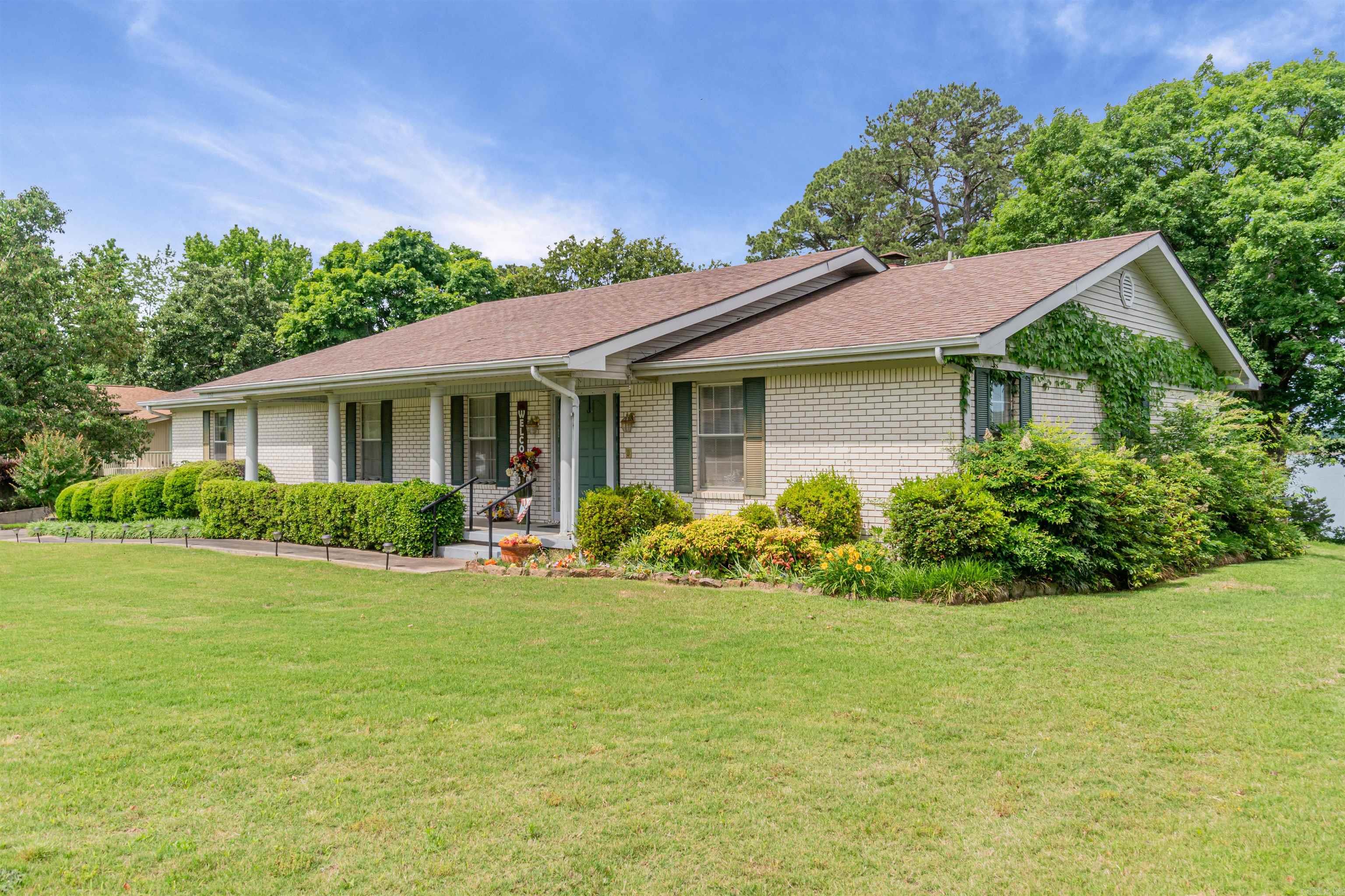 Lakefront Home  on Greers Ferry Lake !! Beautiful view of the Lake .3/2.5  2945 sq ft Lots of closet space.Built in shelves.Open floor plan,big deck on the back where you can sit and view the beauty of nature. Move in ready!! Walking distance to Sandy Beach. Must See!!
