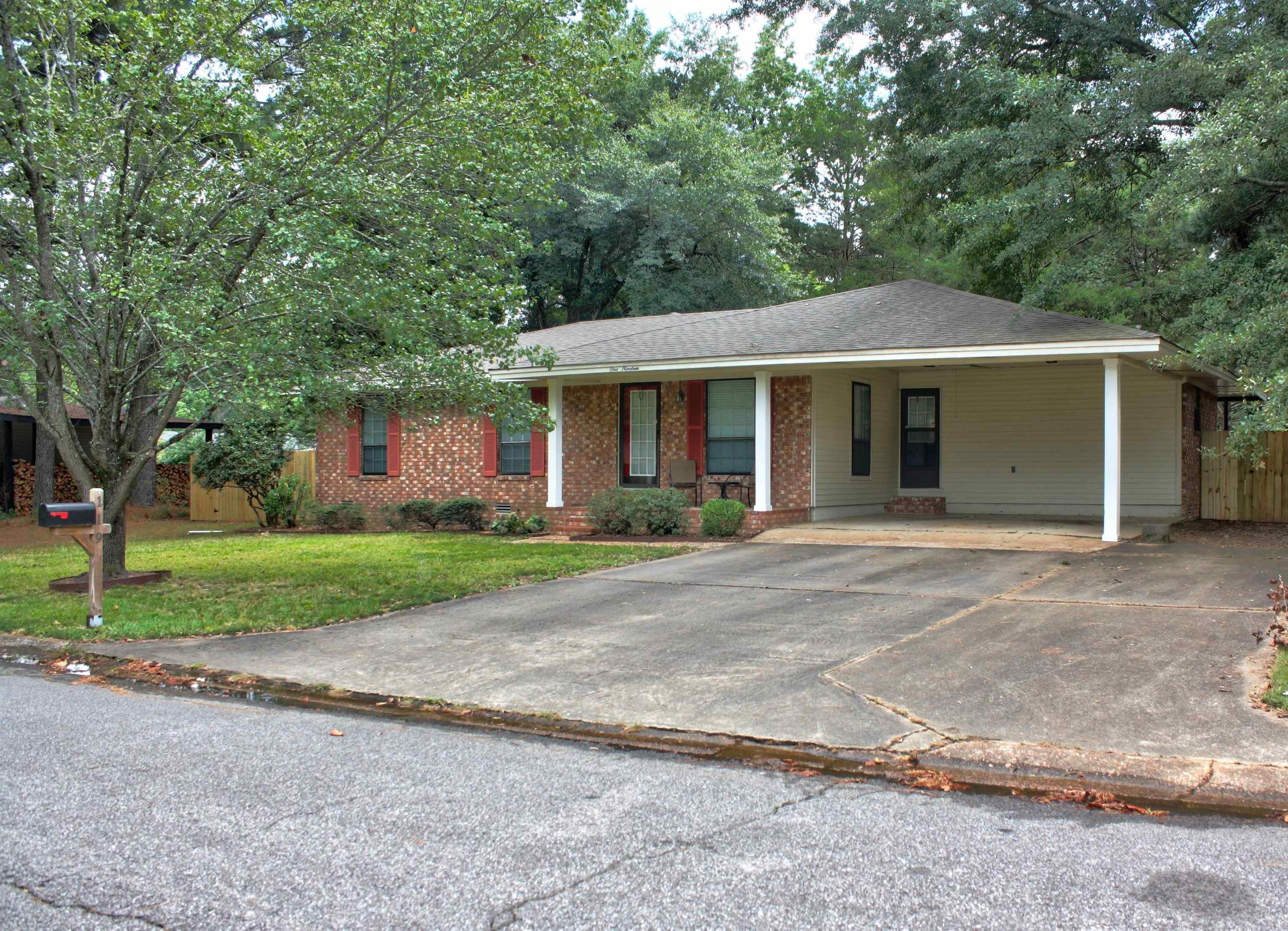 Beautifully maintained 3 bed / 2 bath home in Western Hills. Set on a spacious 0.63 acre lot, this property is surrounded by mature trees, offering both shade & a sense of privacy, with plenty of open space perfect for gardening or outdoor activities. Inside, you'll find a bright & open living area that seamlessly connects to the kitchen, creating a perfect space for family gatherings & entertaining. A formal dining area that could be used as an office or playroom. The home features laminate flooring thru-out, w/ new vinyl in the kitchen & wet areas, all enhanced by fresh paint that makes the space feel modern & inviting. The bathrooms have been tastefully updated, with the master boasting a large step-in shower. Outside, enjoy the covered rear patio that’s extended to include space for a basketball game or other recreational uses. This property also includes a 12 x 24 storage building/workshop, fully equipped with a workbench, shelving, electricity, & lighting, making it perfect for hobbies, DIY projects, or extra storage. The new 6 ft privacy fence ensures your outdoor space is secure & secluded. The seller believes the roof & HVAC system are both approximately five years old