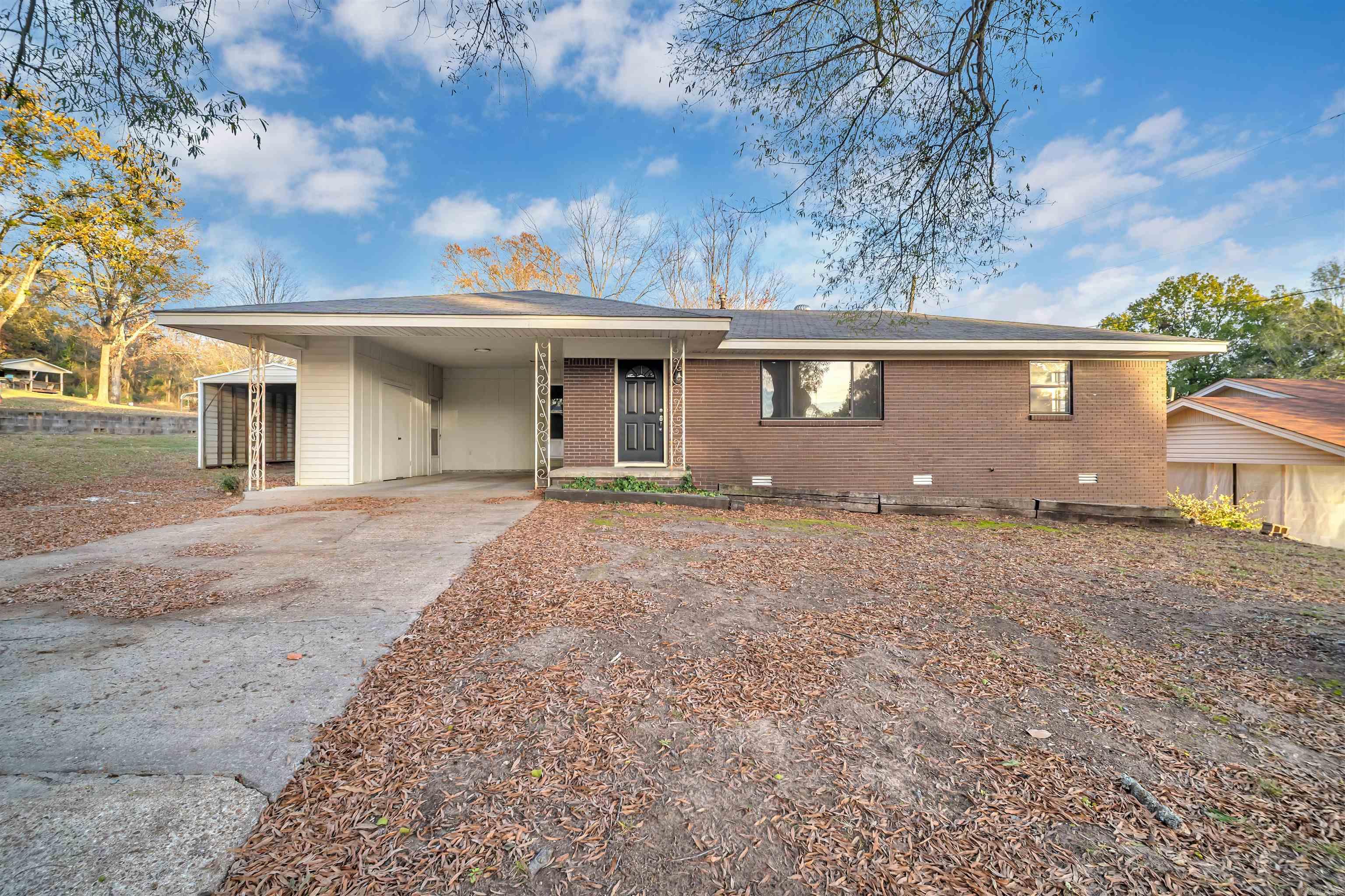 This home features newly installed vinyl floors and fresh paint throughout, creating a clean and modern look. The bonus room offers versatility as an extra bedroom or office. The laundry room is equipped with ample cabinet and storage space, providing convenience and organization. Kitchen is immaculate with granite countertops and white cabinets. Updated plumbing and electrical systems ensure efficiency. Centrally located with a fenced in backyard and outside storage building.