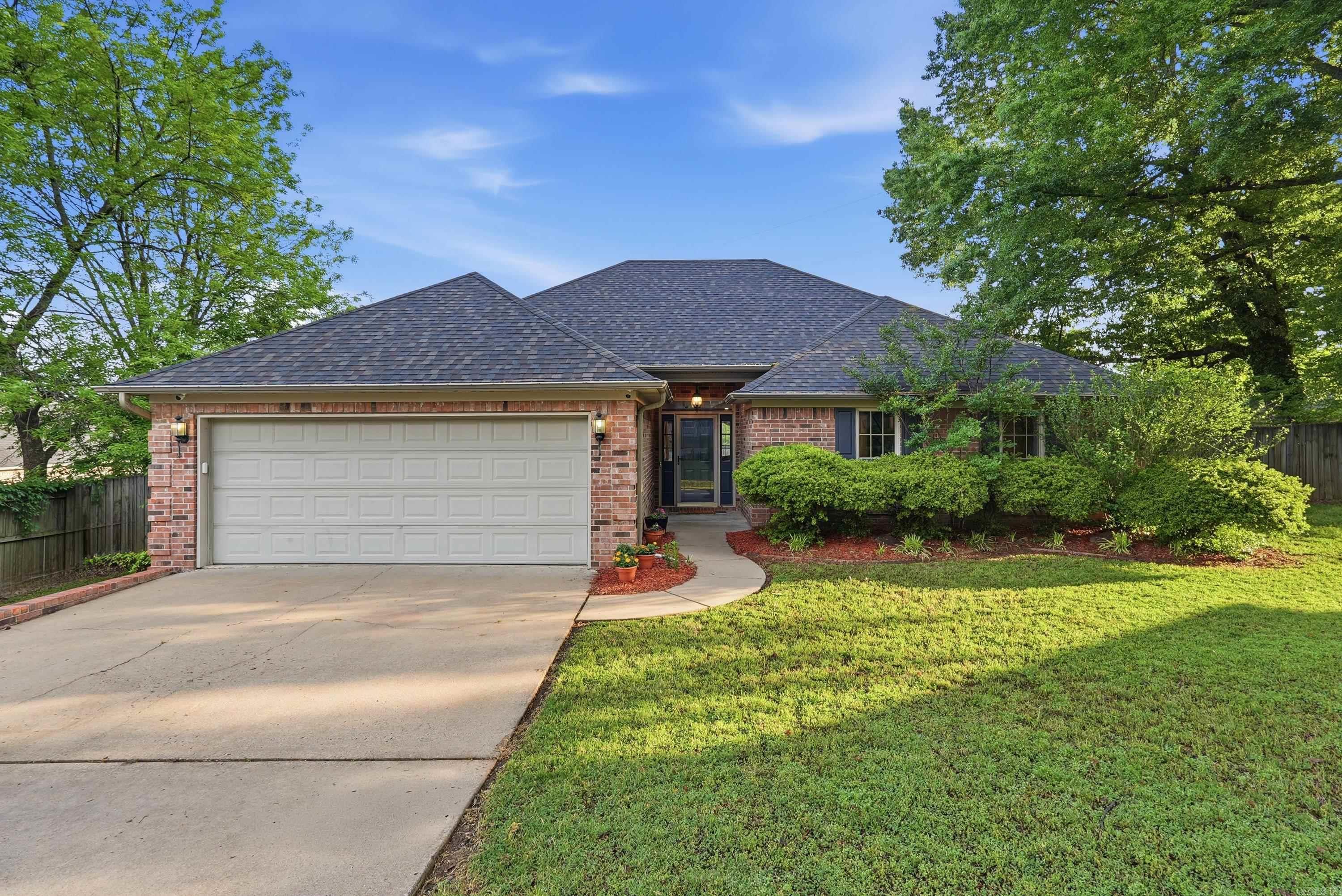 Charming 4-Bedroom Home with Private In-Ground Pool in the desirable Cutter Ridge Subdivision with Tucker Creek walking trail access!! This home is a perfect blend of comfort, convenience, and backyard fun! This inviting home features 4 bedrooms and 2 bathrooms, with a smart split layout: three bedrooms downstairs for easy living and one upstairs bedroom that doubles beautifully as a bonus room, game room, or private retreat. Step inside to discover beautiful LVP floors in the main living areas, creating a warm and welcoming atmosphere. The well-designed floor plan flows effortlessly from the living spaces to the kitchen and dining areas, ideal for both everyday family life and entertaining. Outside, the highlight awaits: a gorgeous in-ground swimming pool, perfect for summer gatherings, weekend relaxation, or cooling off after a day in Central Arkansas. The backyard provides plenty of room for play, gardening, or simply enjoying the peaceful surroundings. Additional highlights include: at the end of a quiet cul-de-sac; New LVP flooring in living areas (2025); New pool pump (2026); New roof, hot water heater, garage door opener, garbage disposal (2020-2021).