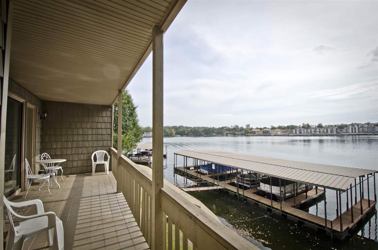 Walk-in level entry..... neat/clean two bedroom waterfront condo completly furnished with covered boat slip.  Wonderful complex with community swimming pool, tennis courts, just minutes from shopping, dining, hospitals....just steps away from your private covered boat dock.....make your appt today to this this unit.