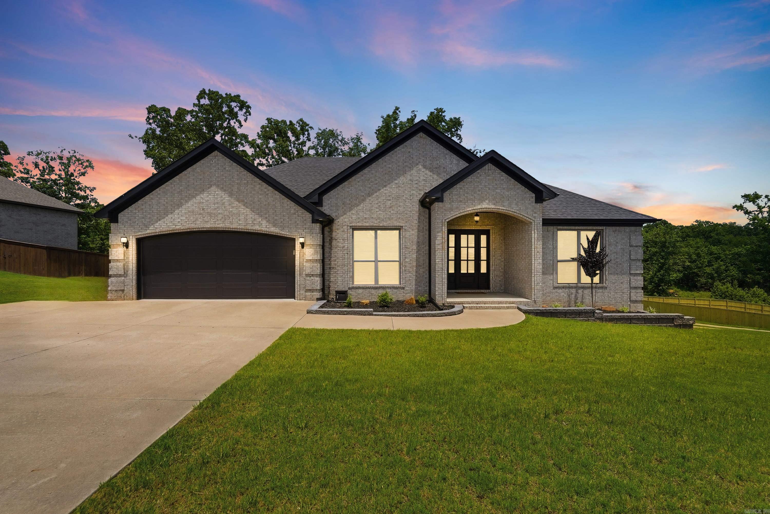 Welcome to this beautiful 3-bedroom, 2-bath home located in the highly desirable Creekside Subdivision in Sherwood! Built in 2021, this well-maintained home offers modern finishes, a functional layout, and thoughtful upgrades throughout.  The spacious kitchen features granite countertops, stainless steel appliances, and ample cabinet space, making it perfect for both everyday living and entertaining. The open-concept design flows seamlessly into the living and dining areas, creating a warm and inviting atmosphere.  The primary suite is a true retreat, featuring a spacious bedroom with a separate nook that can be utilized as a home office, nursery, sitting area, workout space, or flex room to fit your needs. The en-suite bathroom offers double sinks, a separate vanity area, and plenty of storage.  Step outside to enjoy the added privacy of green space behind the home, providing a peaceful backdrop!! Additional improvements include expanded driveway space for extra parking and updated landscaping that enhances the home’s curb appeal.  With modern construction, desirable features, and a fantastic location, this move in ready home is one you won’t want to miss!