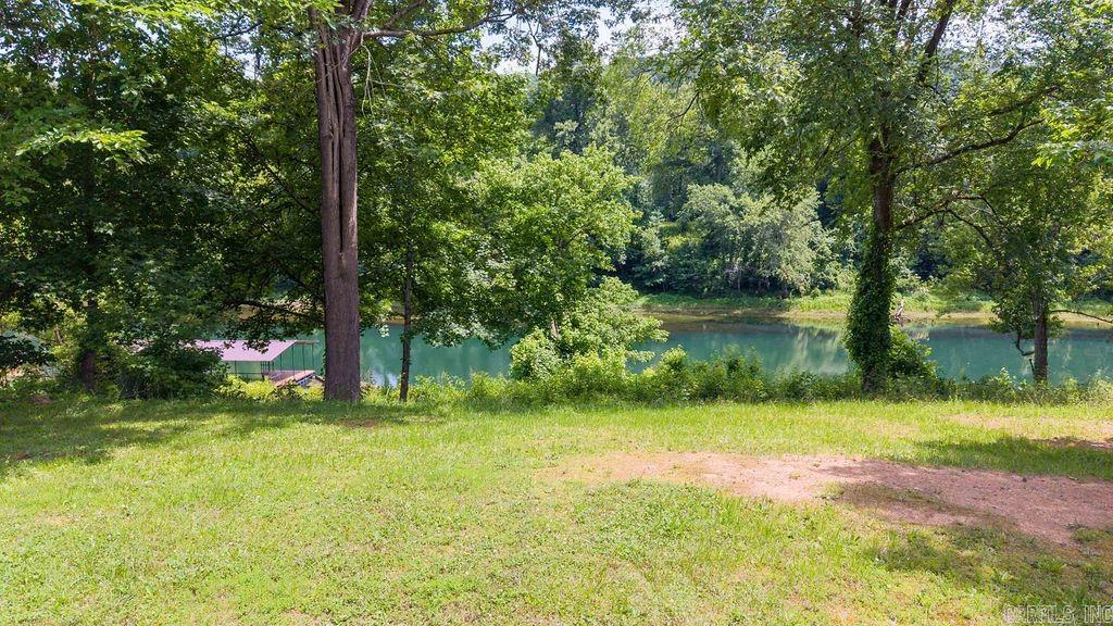 3.09 Acres located in upscale Primrose Creek on the Little Red River! Build your forever home on this beautiful slice of heaven with 385 ft of river frontage! Primrose Creek is a quiet serene gated community located on the LIttle Red offering a community swimming pool, hiking trails, boat launch and a dock.    There is also a fully furnished cabin for sale adjacent to this property, mls # 26023268, both properties can be bought together for $750,000.00
