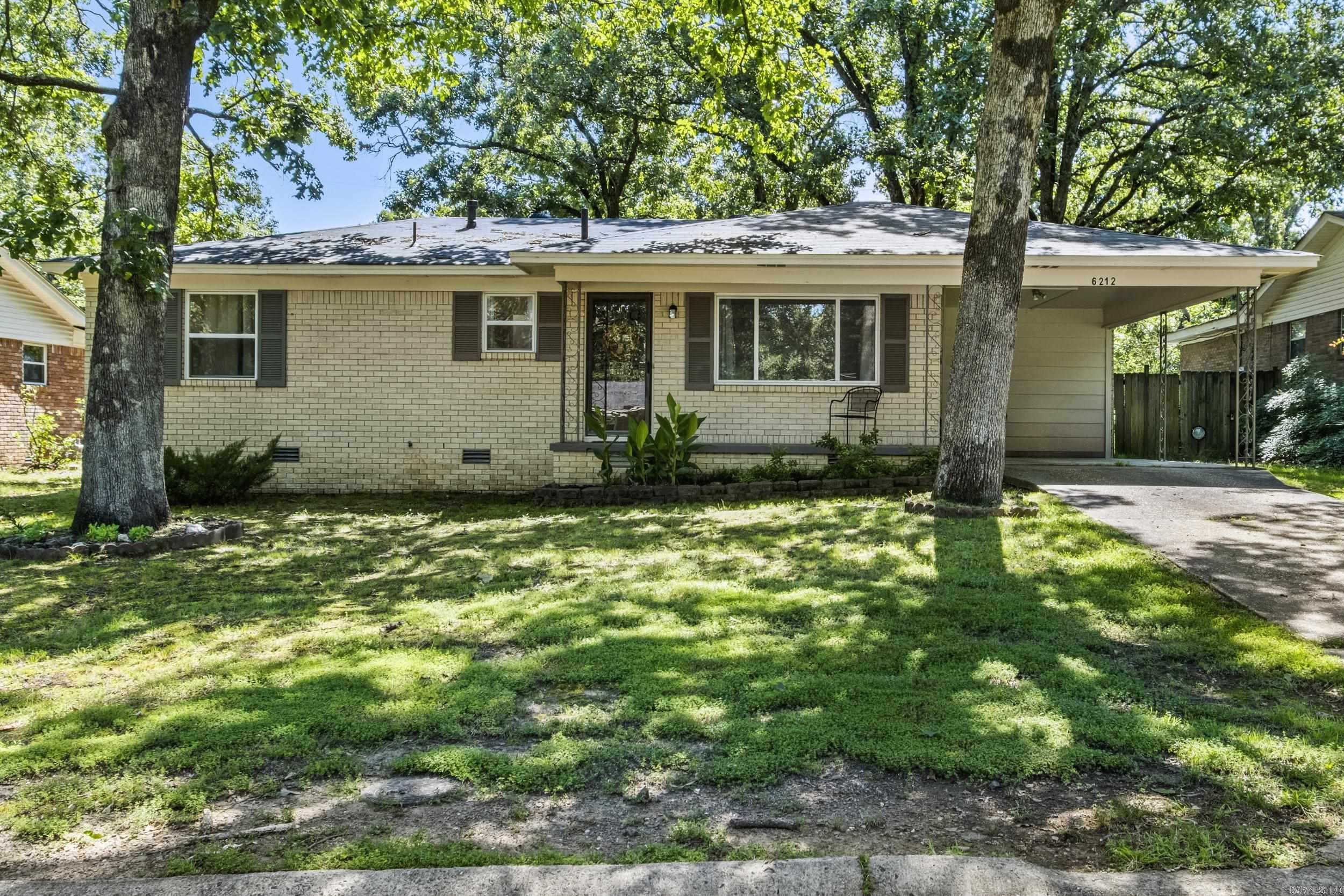 Cute! Cute! Cute! AND...completely remodeled home in Indian Hills! This 3 bedroom, 1 bath, 1 level home was remodeled in 2024 with a NEW roof, NEW windows, NEW water heater, NEW heat and air, NEW luxury vinyl plank flooring and NEW insulation! Check out the beautiful, homey kitchen boasting quartz counters and painted cabinetry.  Appliances, including gas range, microwave, dishwasher and disposal, were all NEW in 2024. The fully remodeled hall bath features an adorable subway tile, walk in shower and beautiful updated vanity. The laundry room is off the kitchen for easy access. Great level, fenced in backyard with patio and storage building. One car carport. Super close to shopping, dining, and entertainment. This one is ready for a new owner!