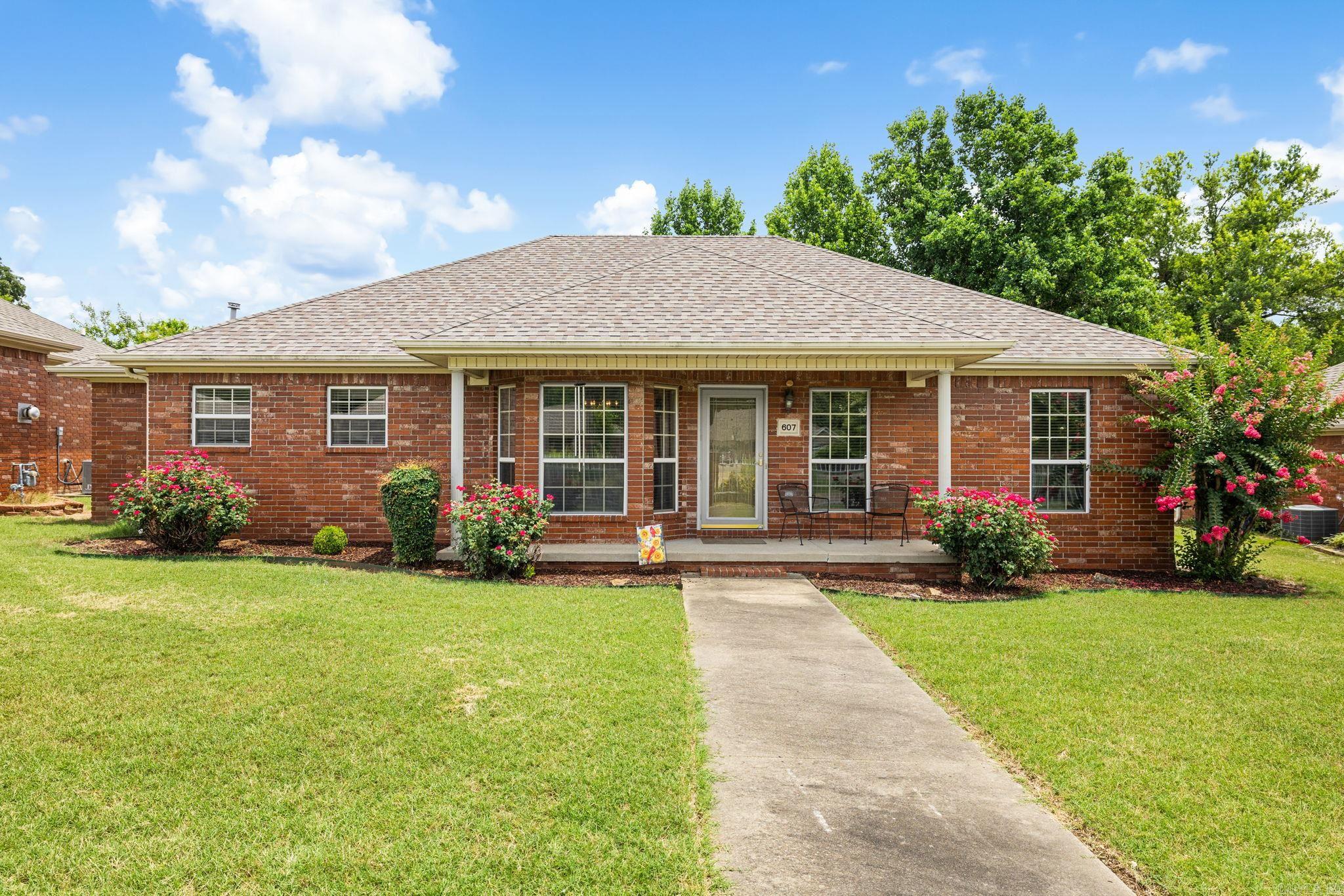 Welcome home to this beautifully maintained 2-bedroom, 2-bath home located in a highly sought-after 55+ gated community! Designed for comfortable living, this home offers spacious room sizes, walk-in closets, and an abundance of storage throughout. The inviting living room features custom built-ins and a cozy gas fireplace, creating the perfect space to relax or entertain. Durable LVP flooring flows throughout the main living areas, adding both style and easy maintenance. The kitchen comes complete with a refrigerator, and the washer and dryer will also convey, making this home truly move-in ready. Outside, you'll appreciate the rear-entry 2-car garage with additional storage cabinets that will remain with the property. Enjoy low-maintenance living in a welcoming community while taking advantage of all the conveniences this home has to offer. Don't miss your opportunity to make it yours!