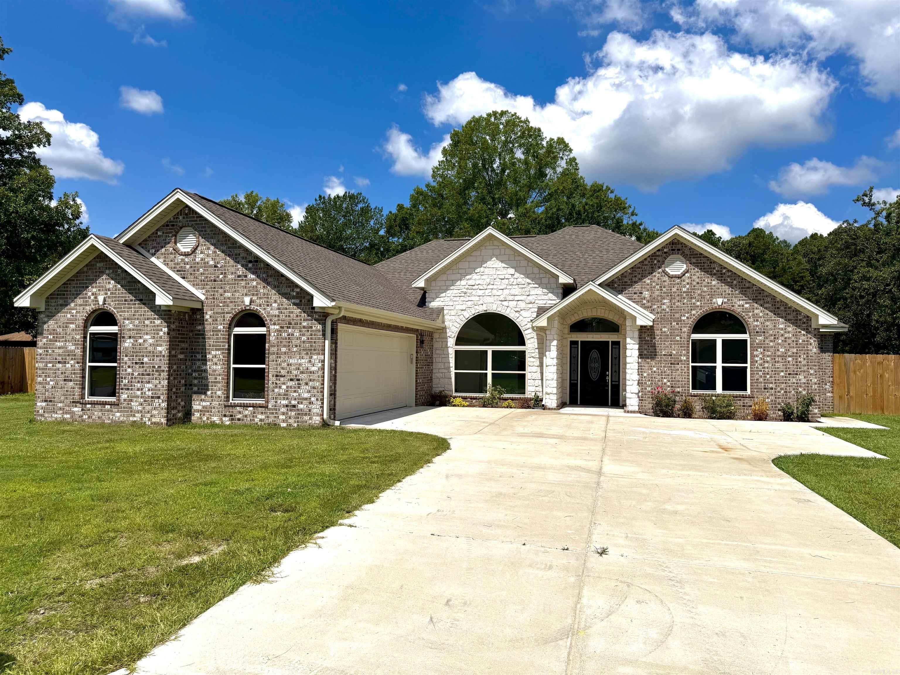 New Construction in the White Hall School District!  Don't miss this beautifully designed new construction home located in the White Hall School District. With a functional floor plan and luxury finishes throughout, this home offers comfort, style, and plenty of space for everyday living.  The spacious primary suite features a vaulted ceiling with hidden accent lighting, creating a warm and inviting atmosphere. The primary bathroom includes a large Jacuzzi soaking tub, an oversized double walk-in tiled shower, and a generous walk-in closet with plenty of storage.  Each bedroom includes its own walk-in closet, while the dedicated mudroom offers laundry hookups, ample counter space, and built-in cabinetry to help keep everything organized.  The home is also pre-wired for a home security system, making it easy to add additional peace of mind.  Outside, you'll find a fully privacy-fenced backyard, an oversized two-car garage, and flush-mounted LED soffit lighting around the exterior of the home that automatically turns on at dusk and off at daylight, adding both convenience and curb appeal.  Call today to schedule your own private tour!
