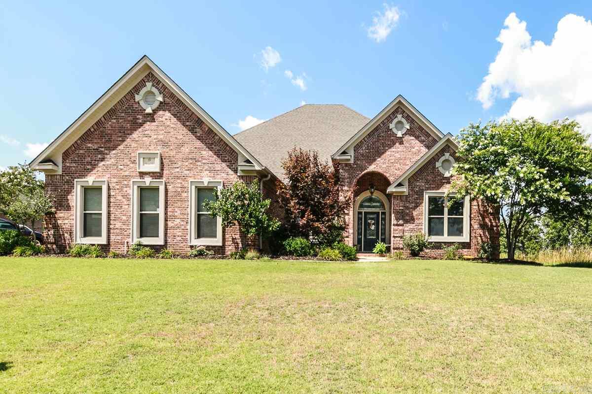 Amazing home in a prestigious neighborhood. This 4 bedroom 3 full bath home with a bonus room is a must see. Tall ceilings with tons of crown molding!  New paint, New counter tops, New hardwood floors, New back splash and New stone on fireplace. Beautiful kitchen with gorgeous counter tops.  Formal dining room, large family room and great fireplace.. Master bedroom is big with a great master bath. Large garage and deck! Call today this won't last long.