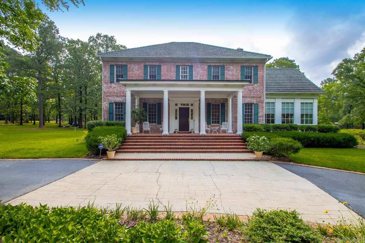 Private / Picture Perfect Home... Amenities include: Approximately 4654 SF, 5 Bedrooms, 4 1/2 Bathrooms, Large Master Bedroom, Living Room with Wood burning fireplace, Office/Study Room, Formal Dining Room, Kitchen/Dining Combo, Wonderful Kitchen with Island, Breakfast Bar, Bonus Room, Basement, 3 Car Garage, Circle Asphalt Driveway, Sprinkler System, 42' x 40' Barn, 1344 SF Manufactured Home, Gated Entrance, Storm Shelter, All sitting on a tree shaded 23.4 acres +/-, Bryant Schools,& Much More.. A Must See