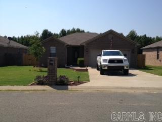 Beautiful Move-in ready home with Large Open den, new carpet through out, new light fixtures, new blinds, new Bosch dishwasher, new hot water heater, new gutters, new front door, new large concrete patio that runs to the side of the house as a side walk, (great area for cookouts and entertaining) crown molding, Neutral paint through out, Walk in closet in Master bedroom, PRIDE OF OWNERSHIP SHOWS HERE!!! sq. footage is estimate. Measuring encouraged.