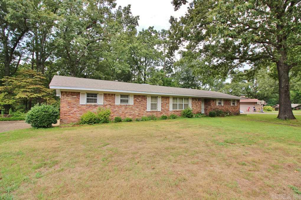 Location, Square Footage, Price! Come take a look at this spacious one level home sitting on a large lot with beautiful trees in private back yard. Family room with fireplace, large eat in kitchen area with bay window, plus formal dining/living , side load garage with storage room, all this conveniently located in Brownwood Subdivision.