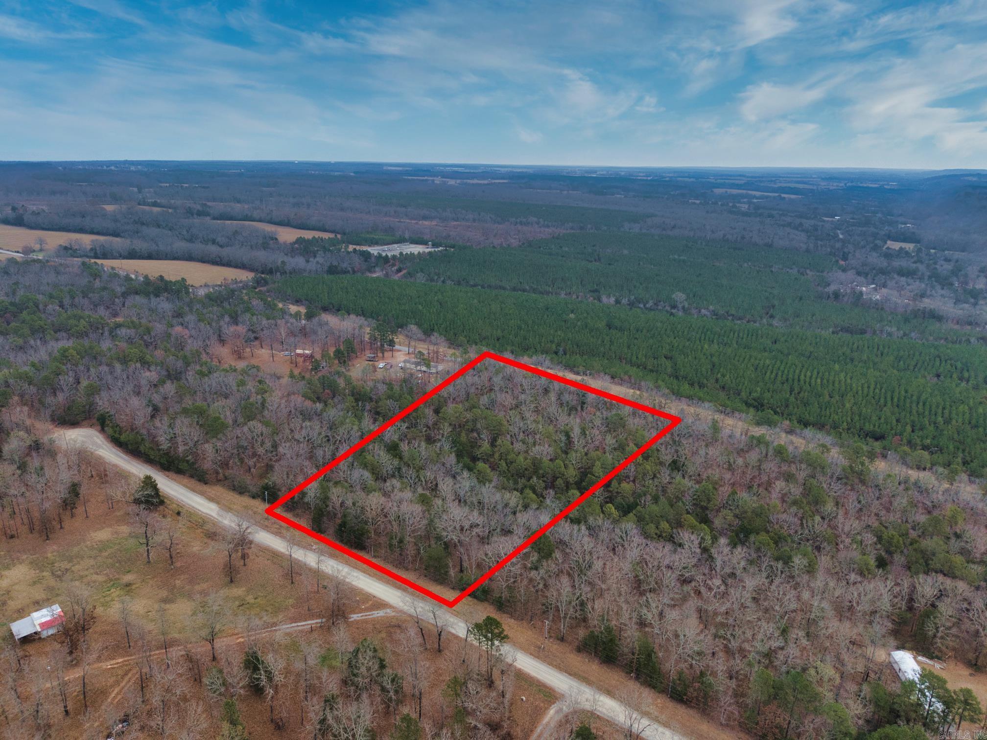 Nestled in the peaceful countryside of Quitman, Arkansas, this beautiful 5-acre tract on Ouachita Drive offers the perfect opportunity to build your dream home, weekend retreat, or investment property. Located within the Quitman School District, this vacant land provides a great combination of privacy, natural surroundings, and convenient access to nearby amenities. With plenty of space for a custom home, workshop, outdoor living area, recreational use, or additional improvements, the possibilities are endless. Enjoy the quiet atmosphere of rural living while still being within reasonable driving distance to Conway, Greers Ferry Lake, and other Central Arkansas destinations. Whether you are looking for a homesite with room to spread out, a future development opportunity, or land to hold as an investment, this property offers flexibility and long-term potential. Utilities availability and restrictions to be verified by buyer. Don’t miss the chance to own acreage in a growing and desirable area of Central Arkansas.