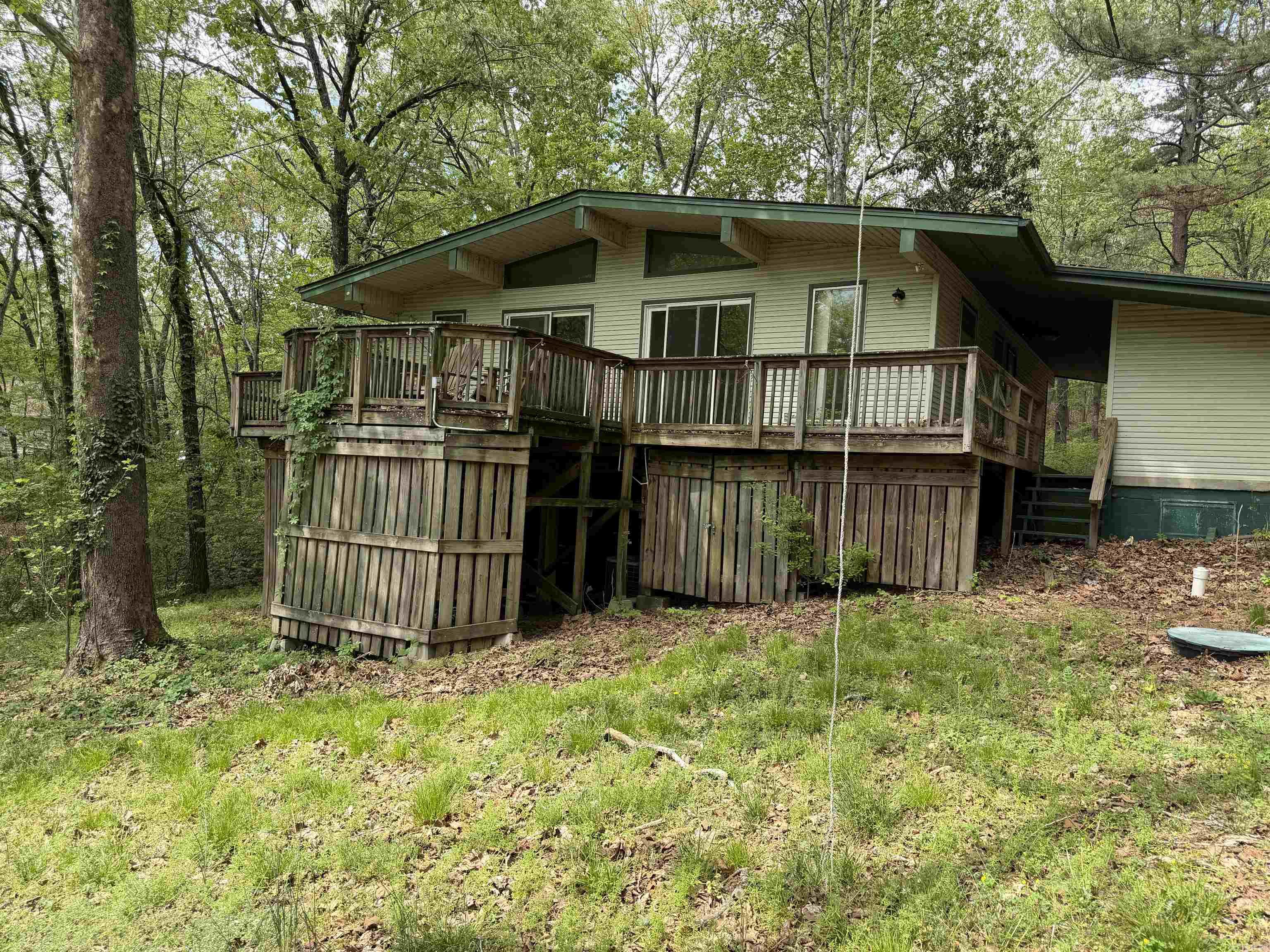 Lake Home on 2.36 AC M/L! Check out this home with a view of the lake off of the back deck. You will love this one, located in the town of Cherokee Village. Buyer to verify all information about property, call today to schedule a look.