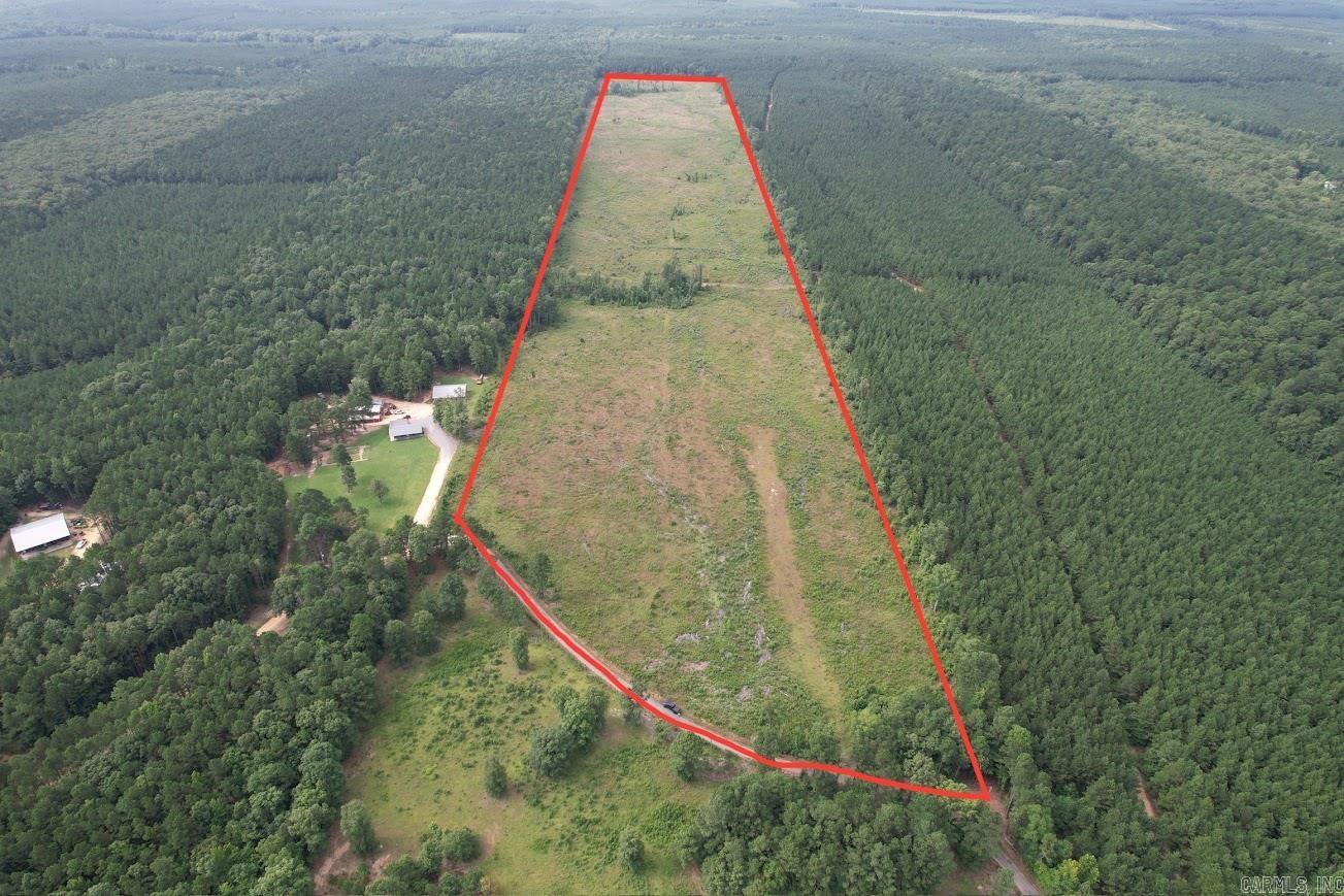 Come check out this 67 acre tract of land just East of Sheridan Arkansas in the Prague Community. Property was cleared off in 2022 and new pines planted in 2024. This is an awesome opportunity to develop or subdivide for new homes. Also a perfect location to build your own home or farm. Don't miss out on this great investment!! No restrictions and Septic report placed in MLS Docs. Water and Electric are available on Grant 759.   2 Parcels-001-01795-000 & 001-01853-000