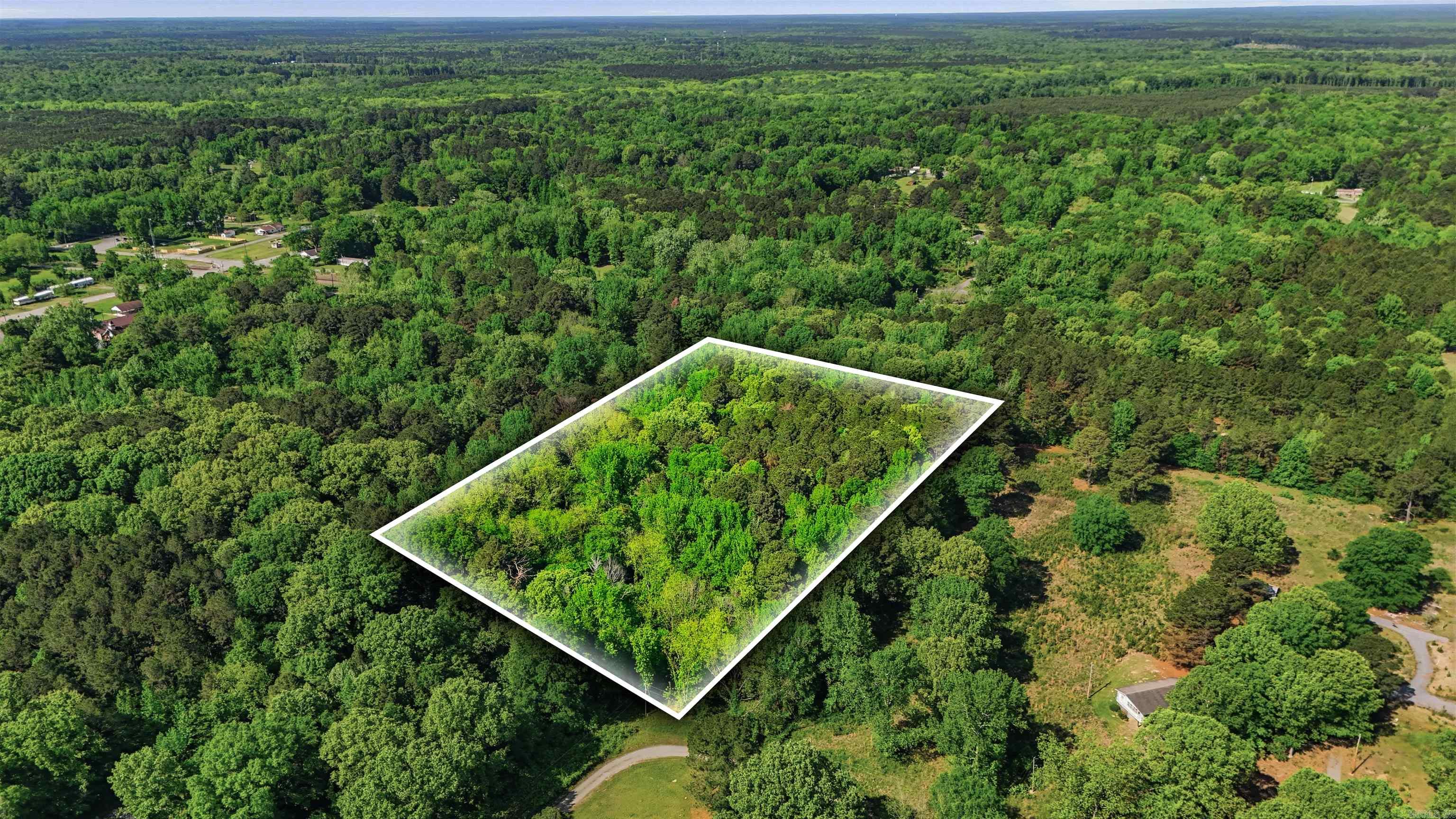 The one thing they aren't making anymore of, is land! This 5 acre tract of land is looking for new ownership. On the outskirts of town is this piece of land that has beautiful trees surrounding it and nothing but space and opportunities to make dreams a reality. For those of you in the market for a raw plot of land to build on, use as a little get away from the city and fast pace life. This property offers all of those possibilities for that special person or family looking to call this place home.