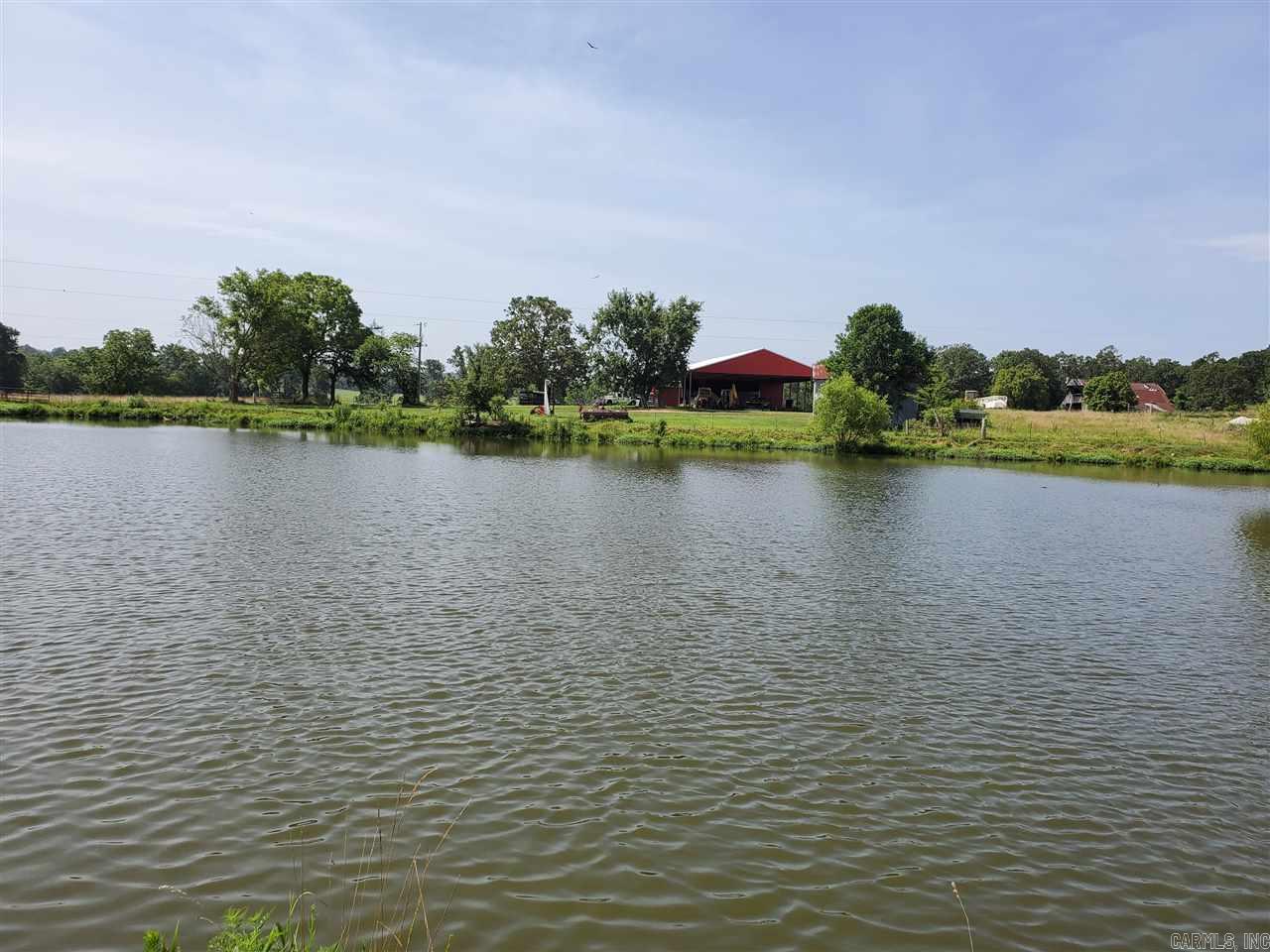 Beautiful 926+/- acre ranch along banks of the Strawberry River near Wiseman, AR.  500+/- acres of pasture and bottomland and 400+/- acres of timber, this stunning property offers plenty of room for cattle ranching, farming, and timber harvest. This property has a home built in 2010 with 3 beds, 2 baths, as well as a hunting cabin. Abundant wildlife for hunting, and the beautiful river for fishing! Property has several barns and a solar-powered deep well for watering livestock. This property is a wonder!