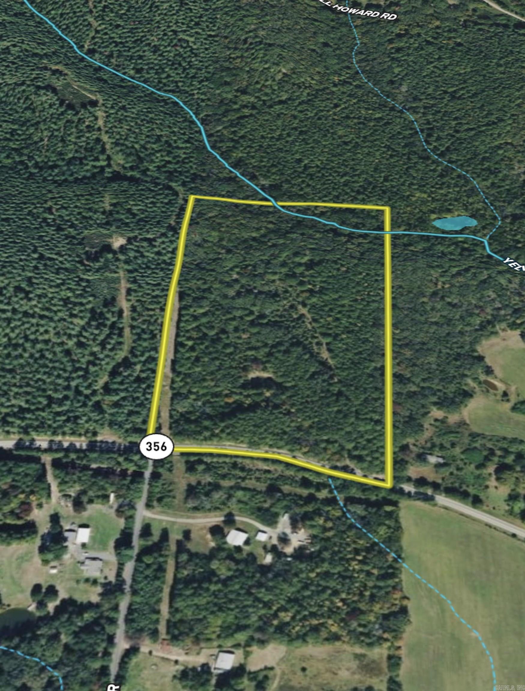 If you're searching for Arkansas land with exceptional homesite potential, this versatile property offers the ideal combination of highway frontage, privacy, utilities, and natural beauty. A gated entrance leads to an established road and old homeplace with a pond, providing an excellent location for a custom home, cabin, or barndominium.  The property features mature timber for long-term value and Yellow Bank Creek, adding scenic beauty, wildlife habitat, and recreational appeal. Electricity is already on the property, making future construction more convenient, while the gently rolling terrain offers multiple buildable sites with privacy and beautiful views.  Outdoor enthusiasts will enjoy excellent habitat for whitetail deer, wild turkey, and other native wildlife, along with opportunities for hunting, hiking, and ATV riding. Combining state highway frontage, utilities, mature timber, water features, and outstanding homesite potential, this tract is ideal for a forever home, weekend retreat, recreational property, or long-term land investment.
