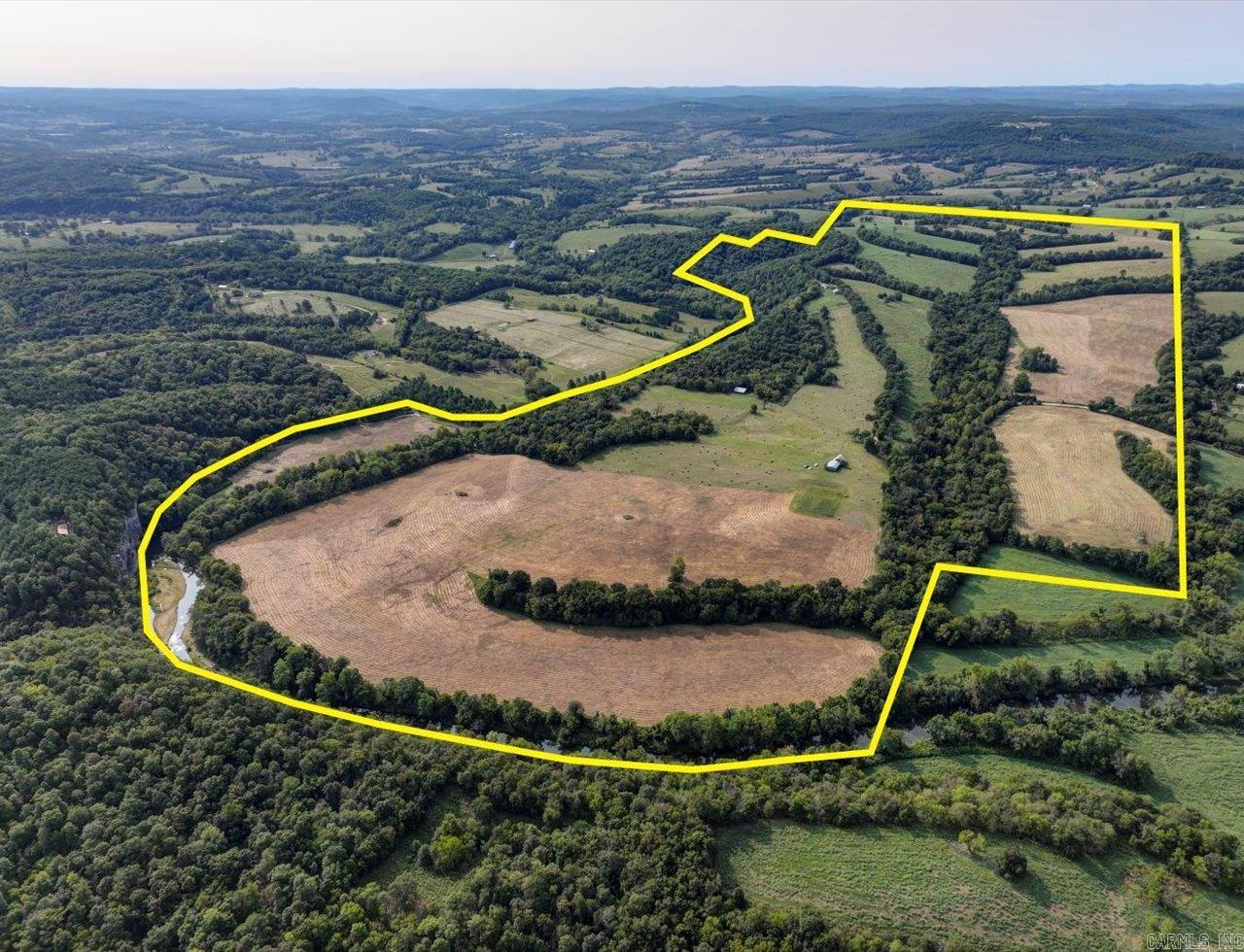 Kings River – Madison 1500 spans an impressive 380 acres and boasts 8,100 feet of Kings River frontage. This tract of land, primarily farmland, offers a unique combination of agricultural value and natural beauty, with a county road conveniently dividing the property for easy access.  The house sits on a 6.28 acre parcel and neighbors the larger Kings River – Madison 1500 Property, offering a prime location with access to Kings River and the surrounding farmland.