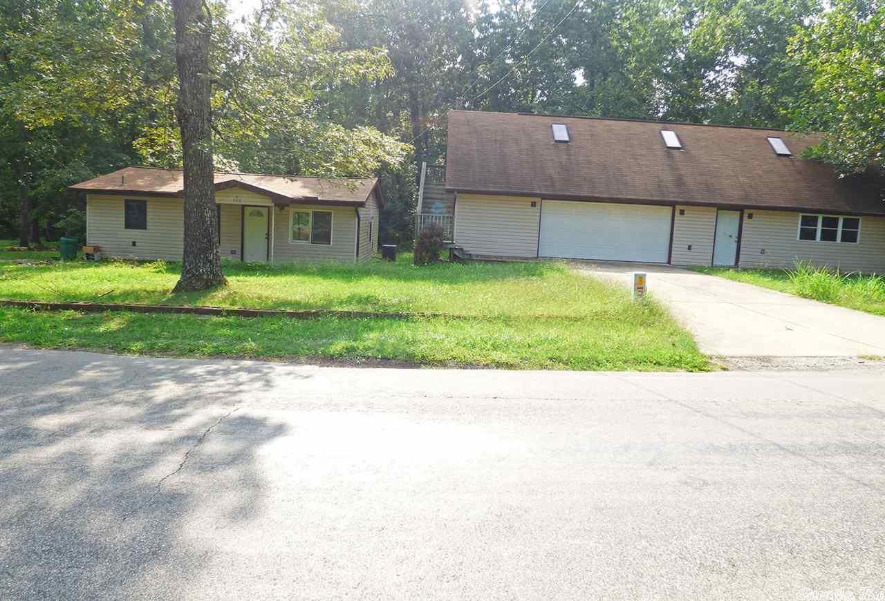 Unique Property - Small House / Large Garage! You will want to see this one! There's a 2 bedroom home with some interior work needed. Be sure to visit the large garage next door with unfinished area on the ground level complete with plumbing for a bathroom. Go up stairs to another area with plumbing for another bathroom. All areas have central heat and air and are ready for finishing. Truly one-of-a-kind property. Priced at $45,000.00!!