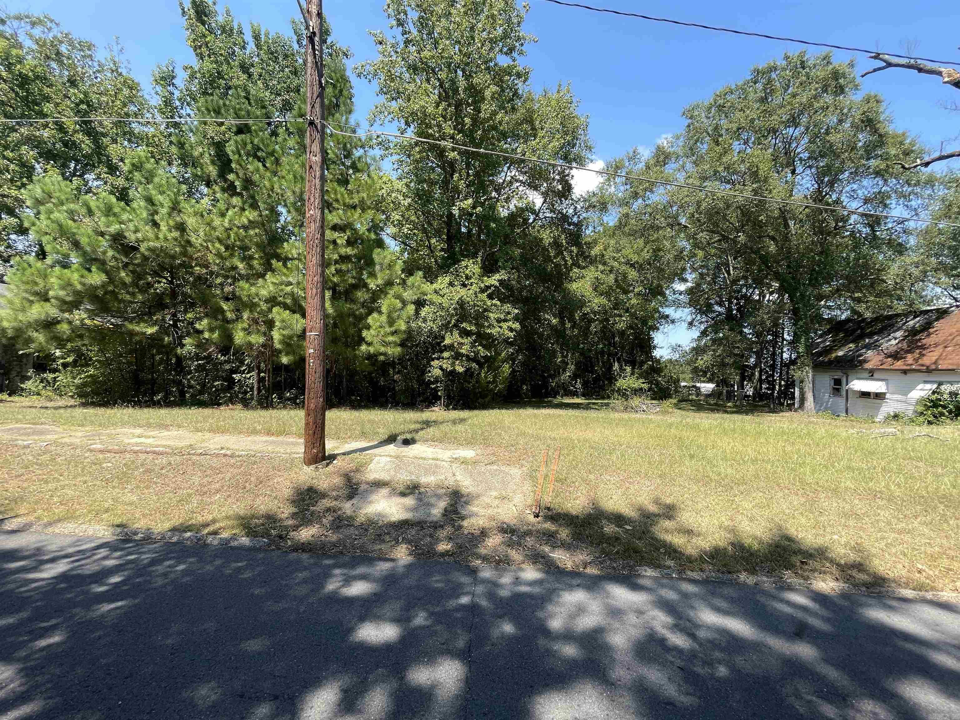 This beautiful residential lot, perfect for a single-family home or multi-family development, is nestled within a short distance of the charming, historic downtown area of Camden. The property offers convenient access to the town's rich history, local shops, and dining, making it an ideal location for those who appreciate small-town charm with modern conveniences. With easy access to utilities in an established neighborhood, you're a step ahead for a new build, providing a hassle-free start to your construction project. The peaceful surroundings and prime location make this lot a wonderful opportunity for homeowners or investors alike. Please refer to the zoning ordinance information on file. **Also see 429 and 437 Maple St** Seller will give priority to a buyer purchasing all three lots