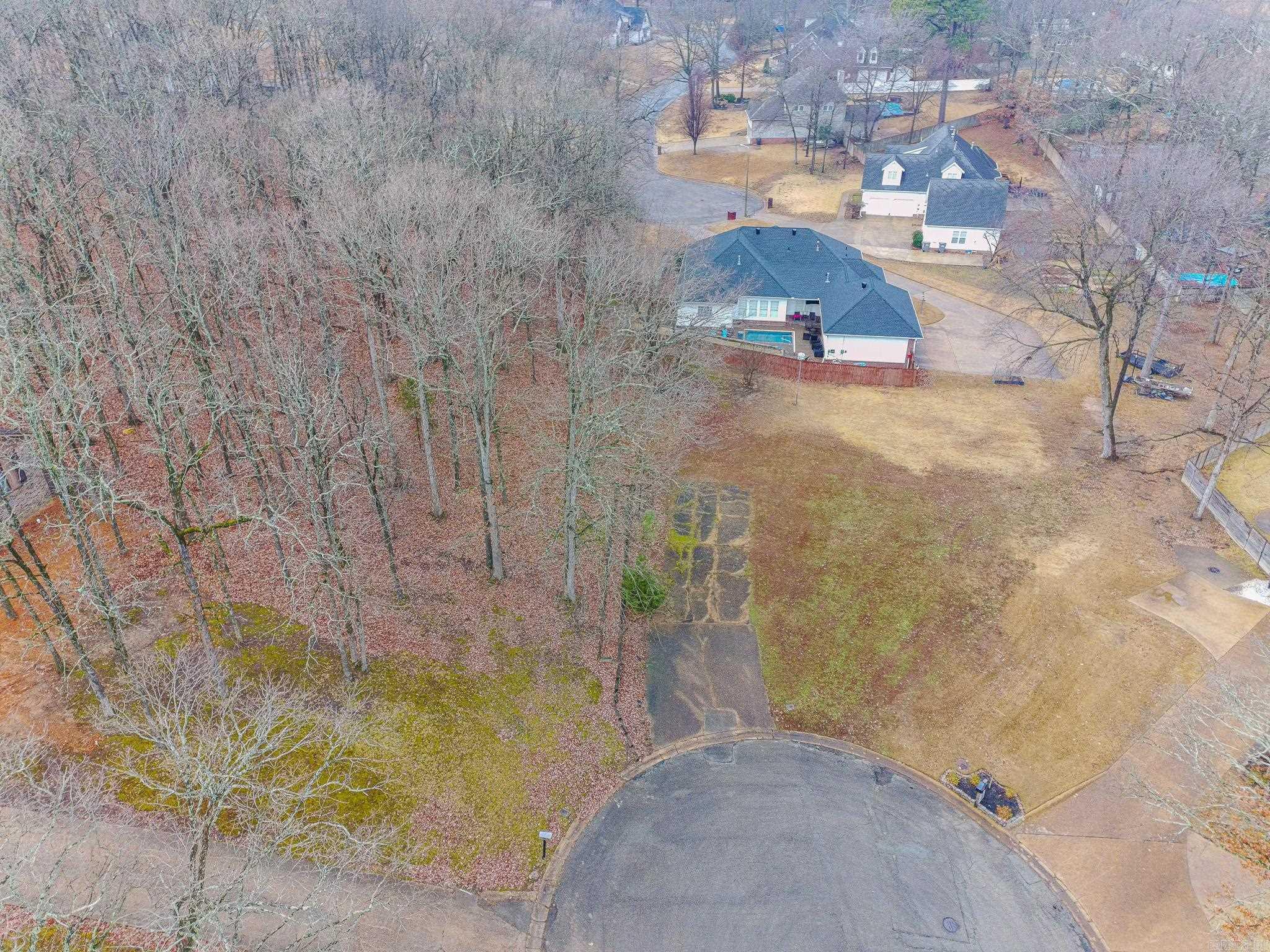 Beautiful building lots located in a quiet cul-de-sac in the desirable Timber Trails neighborhood on Brookhollow Cove. These gently rolling, wooded lots offer a great setting for your custom home in an established area with mature trees and natural hills. Conveniently located in the heart of Jonesboro, just minutes from shopping, dining, schools, and everyday amenities. All city utilities available. Lots may be purchased separately or together, providing flexibility for your building plans. A great opportunity to build your dream home in a well-loved neighborhood with a peaceful feel and unbeatable location. Each lot priced at $49,900