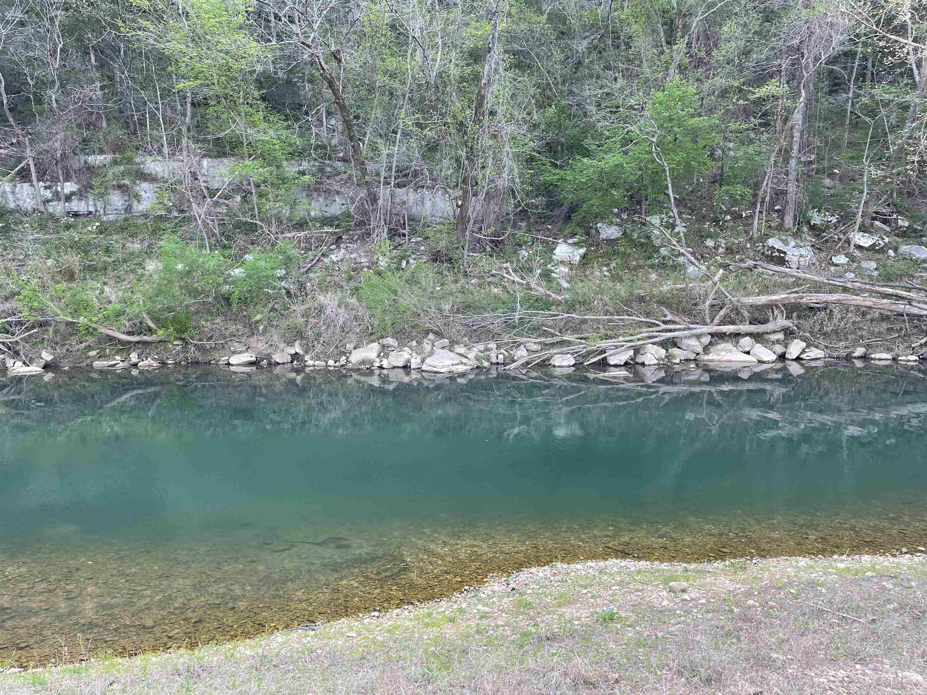Sylamore Creek Lot and separate wooded building lot close to Mountain View AR.  Here is an opportunity to have the best of both worlds. A Sylamore Creek lot and a building lot just right up the road with a view of the creek without having to worry about flooding. This gives you the opportunity to build up high and still have a spot to go hangout and swim on the creek. Lots of potential here for many different things. Call today to schedule a viewing!