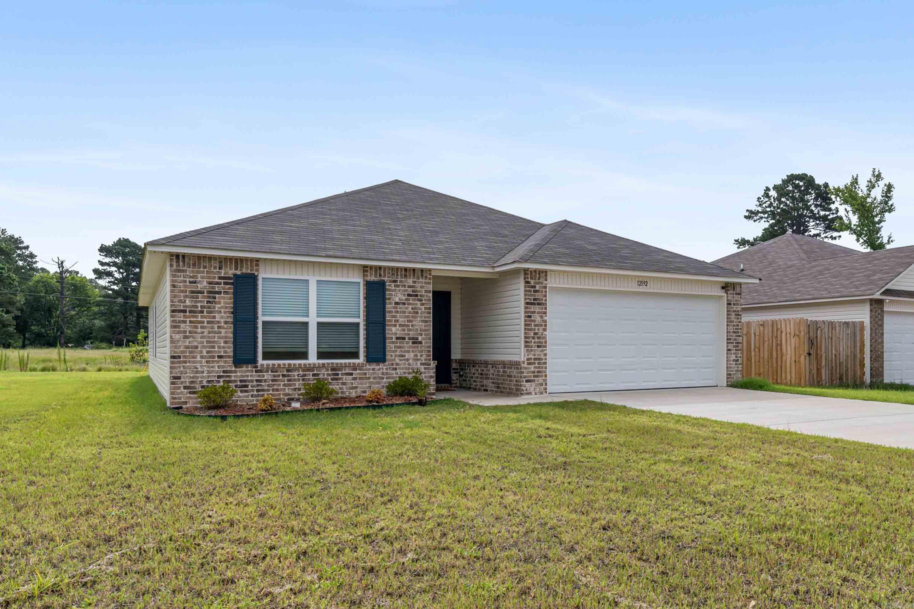 Welcome to effortless, peaceful Saline County living! Situated in one of the quietest and most tranquil spots in the entire neighborhood (far from the water treatment plant and high-traffic areas), this immaculate 3-bedroom, 2-bathroom home combines the fresh appeal of new construction with true serenity.  Step inside to discover a bright, flowing floor plan enhanced by fresh paint, upgraded flooring, and sleek finishes at every turn. The layout maximizes every square foot, offering comfortable private bedrooms alongside welcoming common spaces. Outside, the level yard provides a clean, peaceful backdrop for your favorite outdoor activities.  Location is everything here: enjoy top-tier area schools, proximity to local churches, and the luxury of being only 15 minutes from downtown Little Rock. Positioned alongside brand-new builds in a thriving East End neighborhood, this property delivers unbeatable value, pristine finishes, and unmatched quiet.  Don't let this gem slip by—reach out today to set up your private tour!