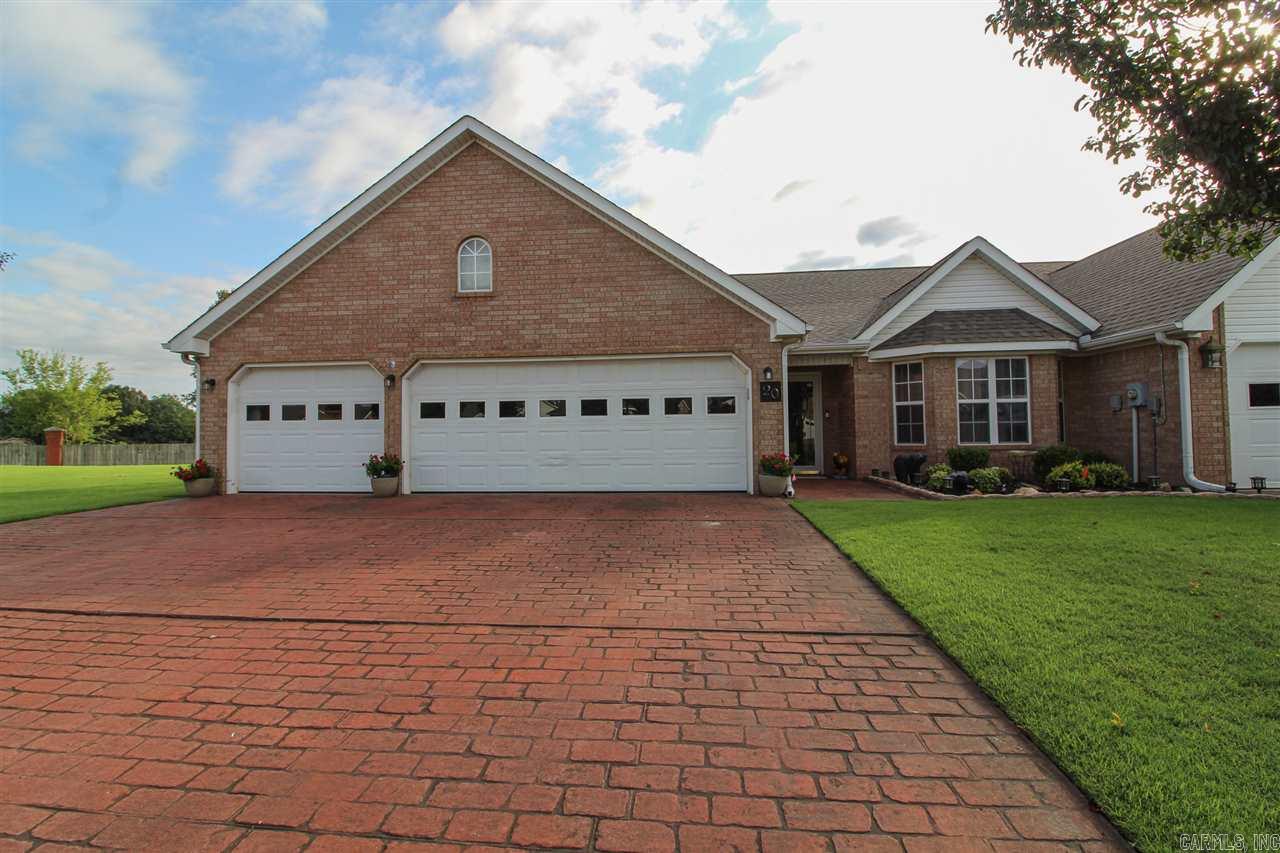 RECENTLY UPDATED, END UNIT CONDO NEAR GOLF COURSE. 3-CAR GARAGE, LARGE BACKYARD W/ ADDED SUN-ROOM AND PRIVATE PATIO. COMMON AREAS INCLUDE BEAUTIFUL POND, GAZEBO AND ADDITIONAL PARKING. WELL MAINTAINED LANDSCAPING AND EXTERIOR (ROOF REPLACED 2019). UPDATED INTERIOR GRANITE COUNTER TOPS, PAINTED GRAY CABINETRY , SOME NEW FLOORING AND NEW 4 TON HVAC UNIT (2020), EXPANDED PANTRY , EXTRA STORAGE AND NEW APPLIANCES.