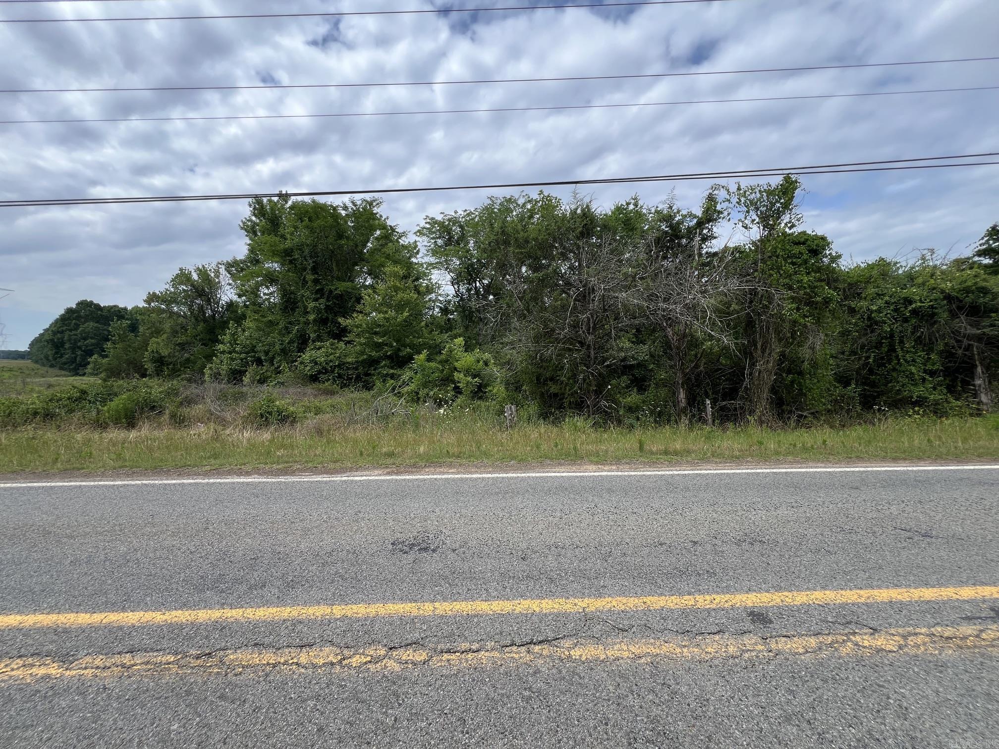 13 acres +/- on Hwy 89 outside Mayflower.  Water and Electricity are there to be connected to.  Will need a perk test.  Survey on file. Call today. Make Fair Offer