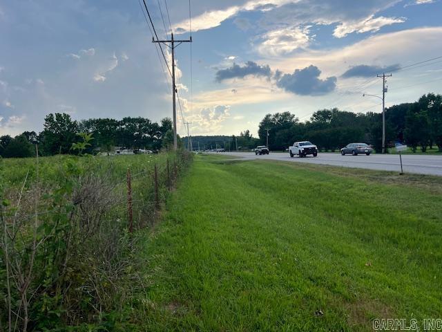 13.70 COMMERCIAL ACRES on U.S. Highway 69 also known as Harrison Street. Approximately 370' highway frontage. Already has an established entrance drive, 6'' city water line, 3 phase power along the front. This land is mostly level and is an excellent location for most any business ventures in the East area where Batesville is growing rapidly. Established commercial businesses already encompass that area so the time is NOW to buy this nice sized lot because there won't be a second chance.