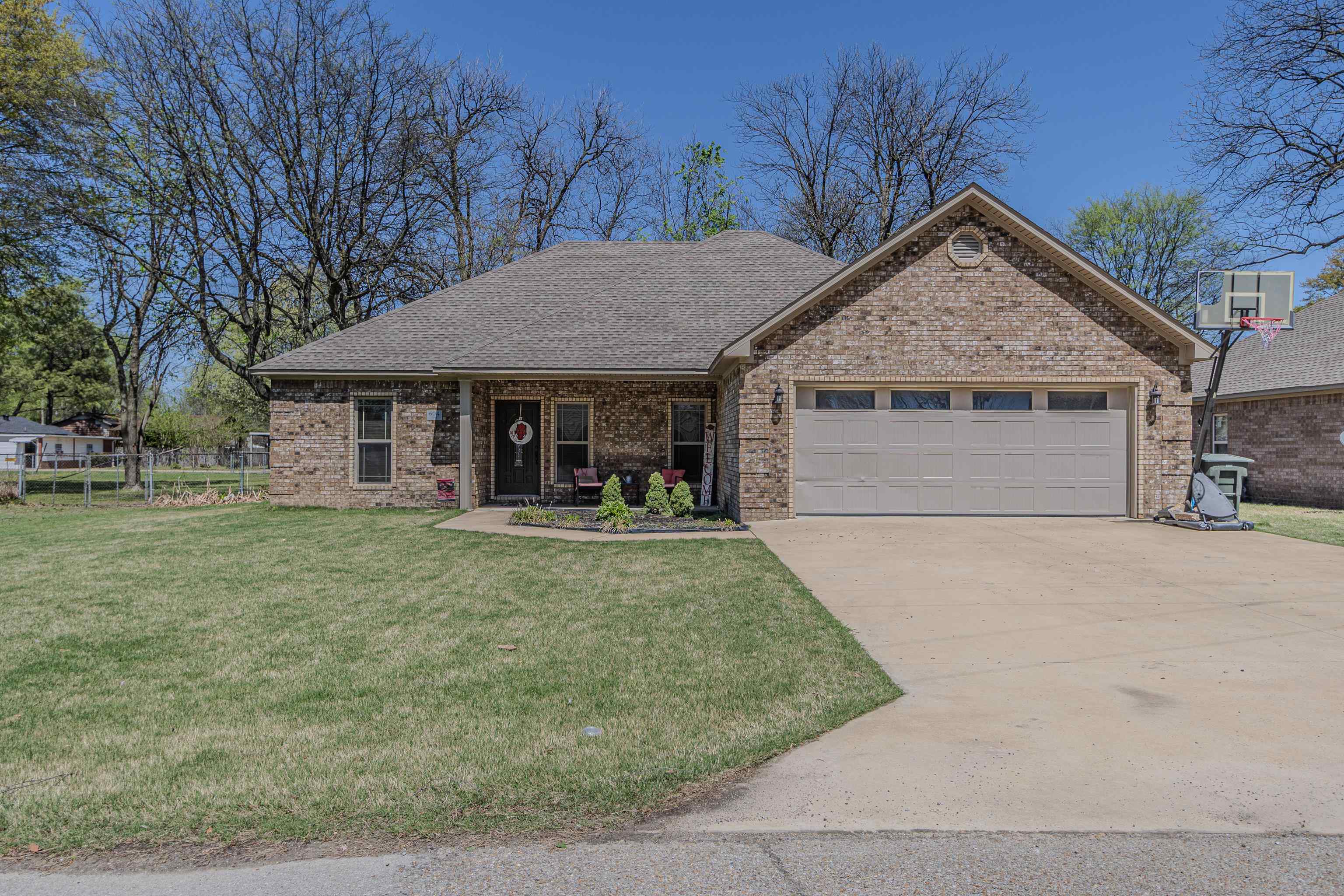 Stylish Comfort Meets Small-Town Charm in Monette, AR! Welcome to this beautifully maintained 3-bedroom, 2-bath home nestled in the heart of Monette just a quick drive from Jonesboro (25 min), Paragould (30 min), and Blytheville (40 min), offering the perfect balance of small town living with city convenience. Step inside to find handscraped engineered hardwood floors flowing throughout the main living spaces, complemented by cozy carpet in the bedrooms. The open-concept layout creates an airy feel, with a welcoming breakfast bar perfect for casual meals or entertaining guests. The tray ceilings in both the living room and the primary suite add a touch of elegance and depth. Enjoy a large, fenced-in backyard ideal for weekend BBQs and don't miss the awning tucked behind the fence, perfect for discreet boat parking. The laundry room adds functionality, while the electric car charging station in the garage makes this home future-ready. Whether you're a first-time buyer, looking to downsize, or ready for a fresh start, this home offers it all-style, space, and smart features in a location that keeps you close to everything Northeast Arkansas has to offer.