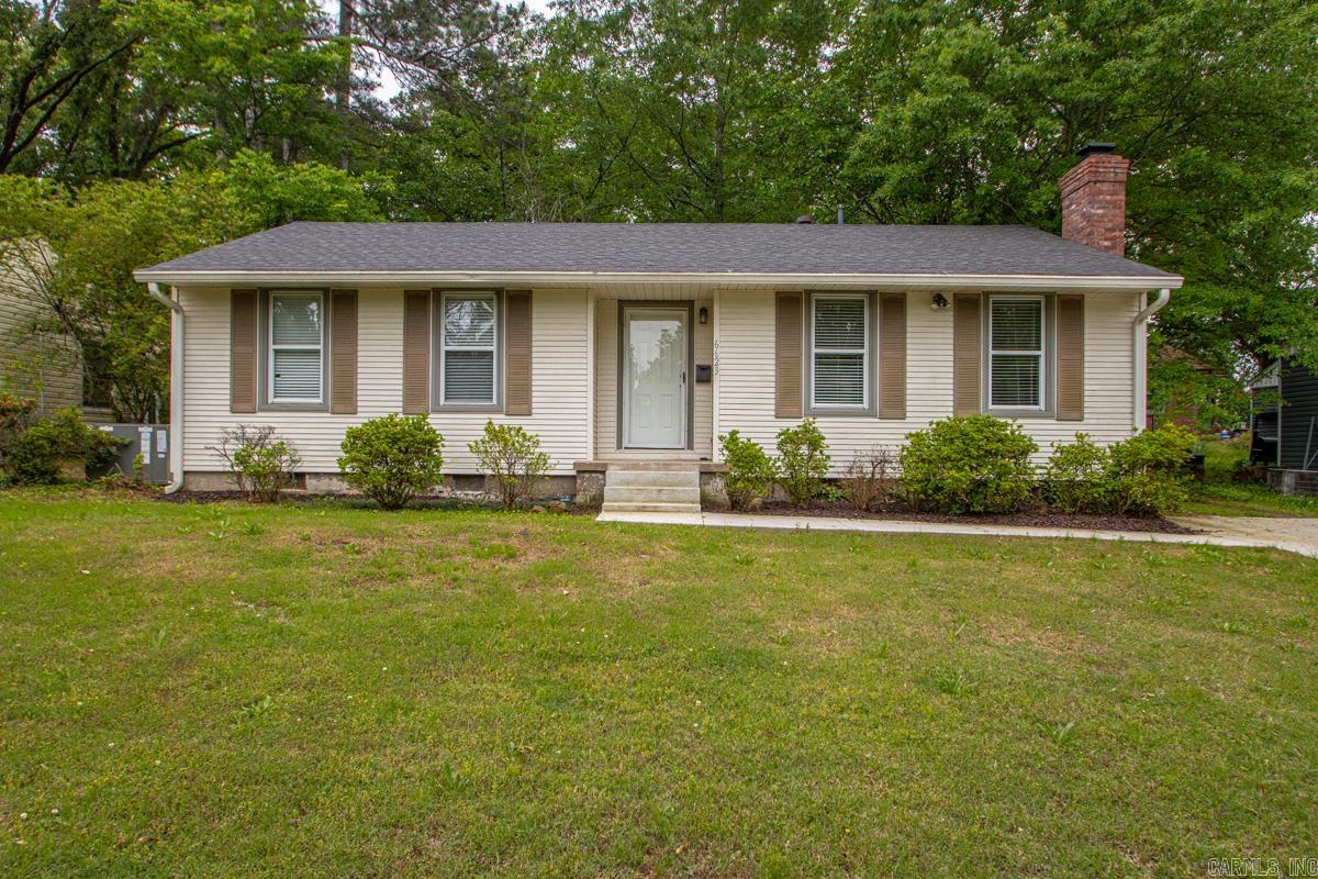 Fall in love with this beautifully maintained and updated 1940's home, offering a seamless blend of classic character and modern peace of mind. This 3-Bed, 1-Bath gem has had key updates performed in 2025-2026 featuring a remodeled bathroom, stylish new kitchen tile flooring, and a new driveway. The home greets you with a fresh, bright coat of interior paint and a kitchen equipped with a new dishwasher and refrigerator. Essential systems are already taken care of, including a new packaged HVAC unit (2025) and a roof that is only 6 years old. Step outside to a fully fenced backyard, providing private and secure space for pets, play or gardening. Ideally situated just minutes from the vibrant dining and shopping in the Heights, Hillcrest, Midtown and Downtown Little Rock areas, this home puts convenience at your doorstep. Whether you're searching for a turnkey first home or a cozy forever home, this updated classic delivers quality, style and an unbeatable location!