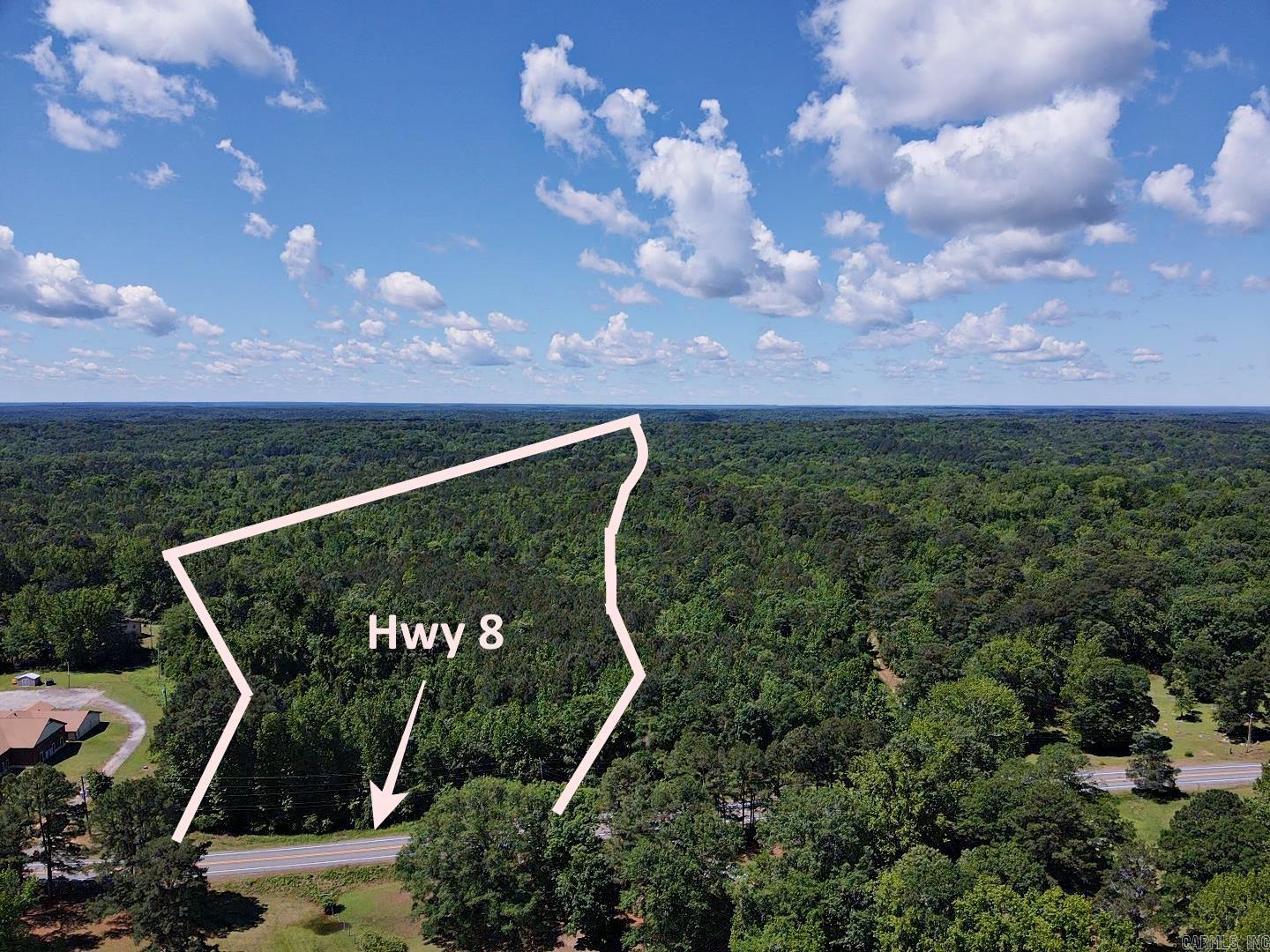 Need highway frontage?  This is it! This is two parcels of land for sale, one containing 11.18 acres and the other 17.92 acres, they are being sold together. This acreage is in a prime location approximately 1.1 miles past Walmart.   It is ideal for local investor to put a subdivision or for a single-family residence that is wanting to develop or homeplace/farm.  With highway frontage on one parcel and located outside the city limits, the possibilities are endless.  Electricity has been on part of the property along with a well and septic system in the past.  Property recently surveyed.  Call today for more details.  (See agent remarks for parcel numbers)